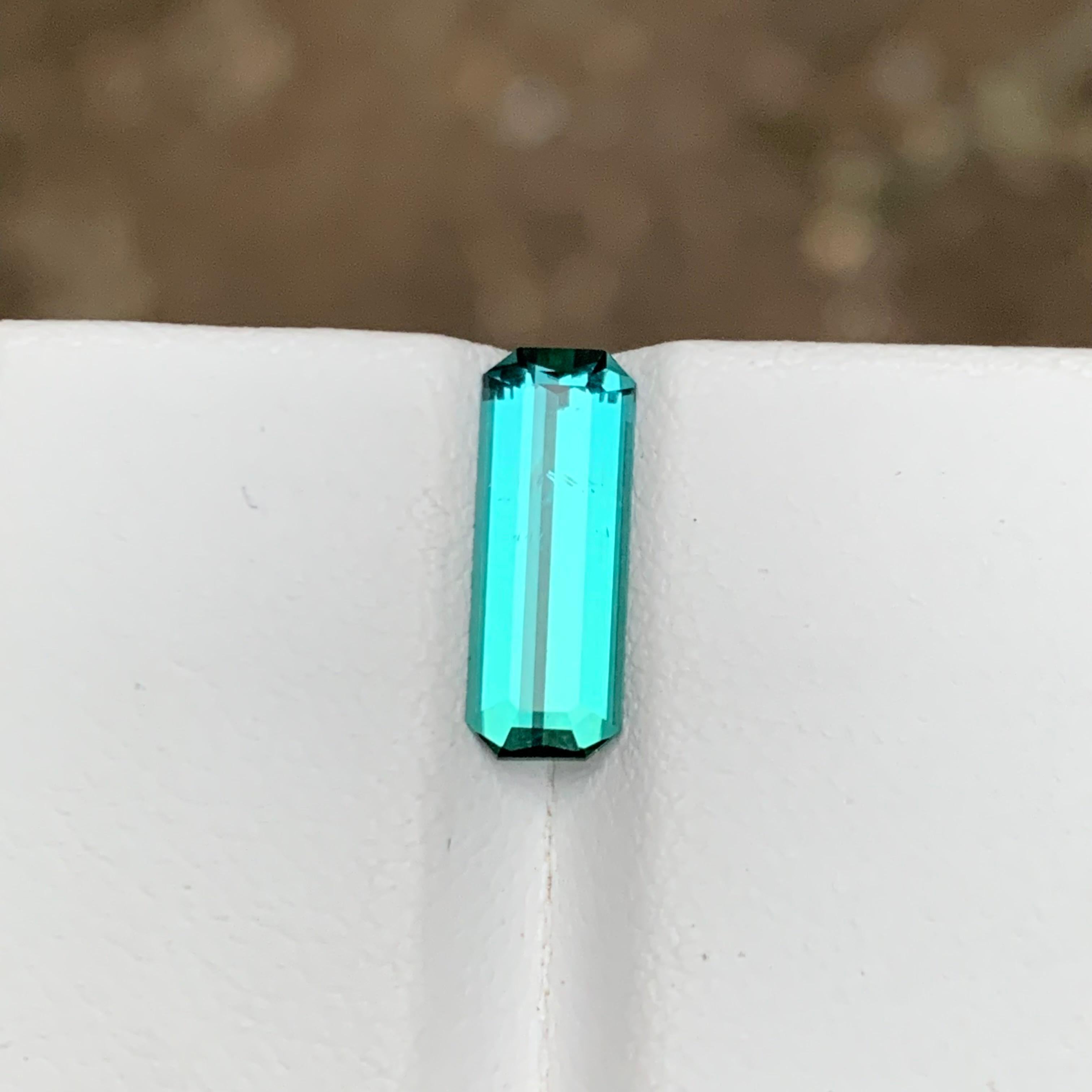 Contemporary Rare Vivid Neon Bluish Green Hue Tourmaline Gemstone 1.75Ct Emerald Cut for Ring For Sale