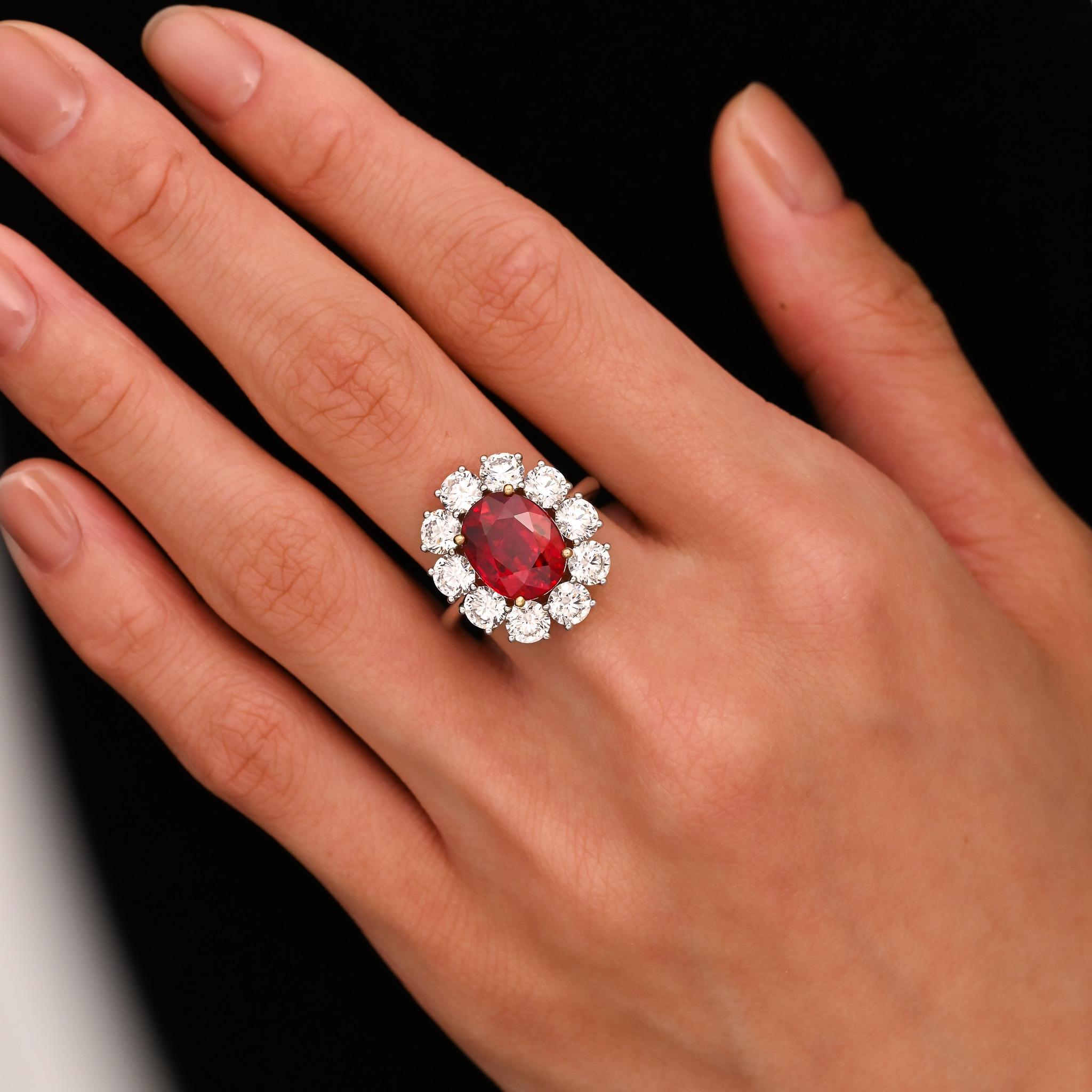 Modern 5.81 Carat Oval Cut Vivid Red Thai Siam Ruby & Diamond Halo 18K Ring For Sale