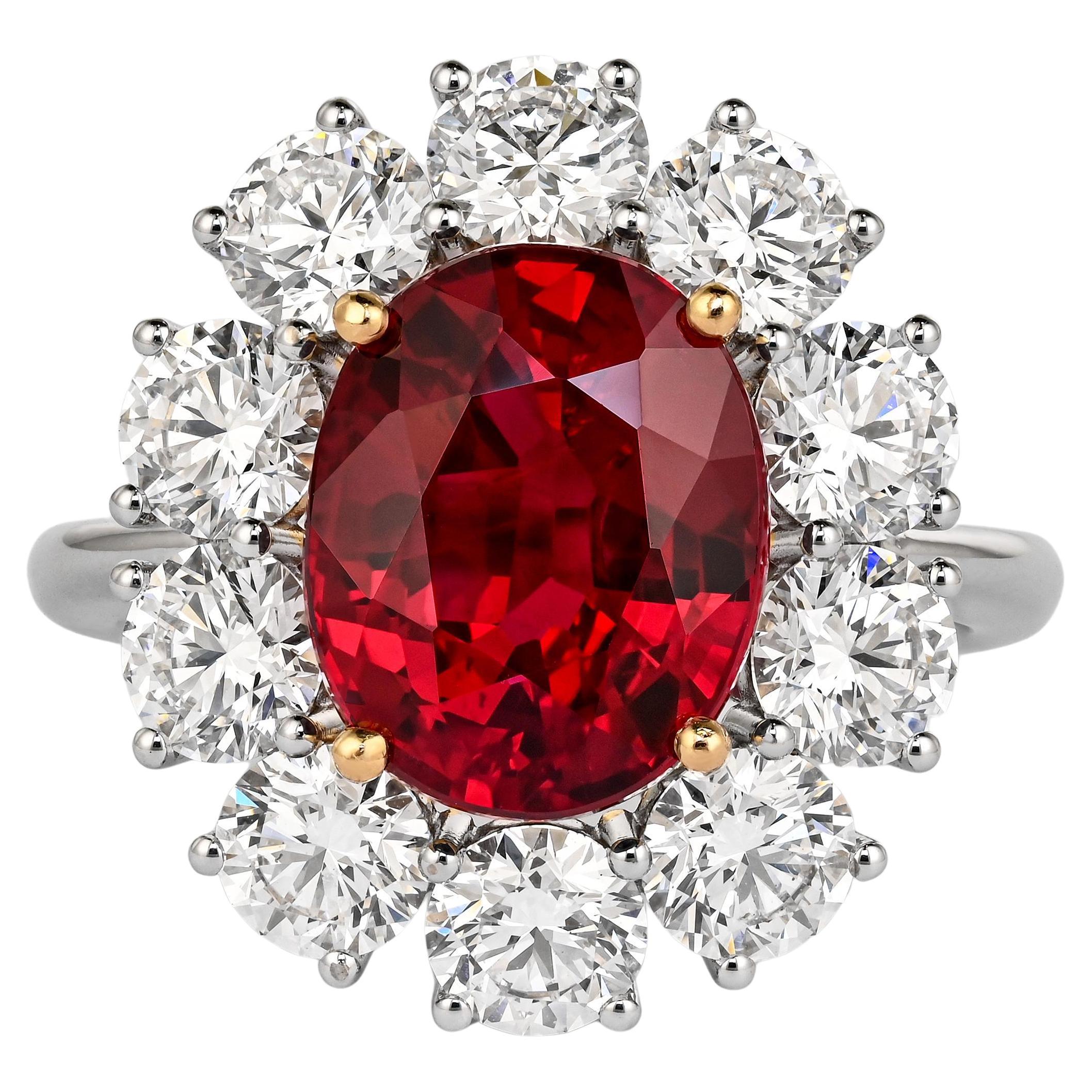 5.81 Carat Oval Cut Vivid Red Thai Siam Ruby & Diamond Halo 18K Ring For Sale