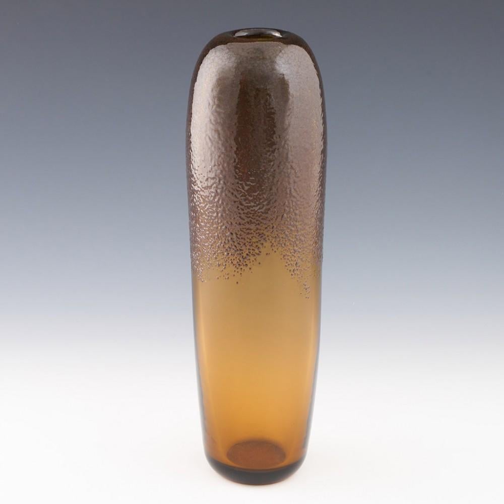A rare 1960s Skrdlovice Torpedo vase designed 1966 made in Czechoslovakia, now Czech Republic. The bowl features amber glass with melted in 