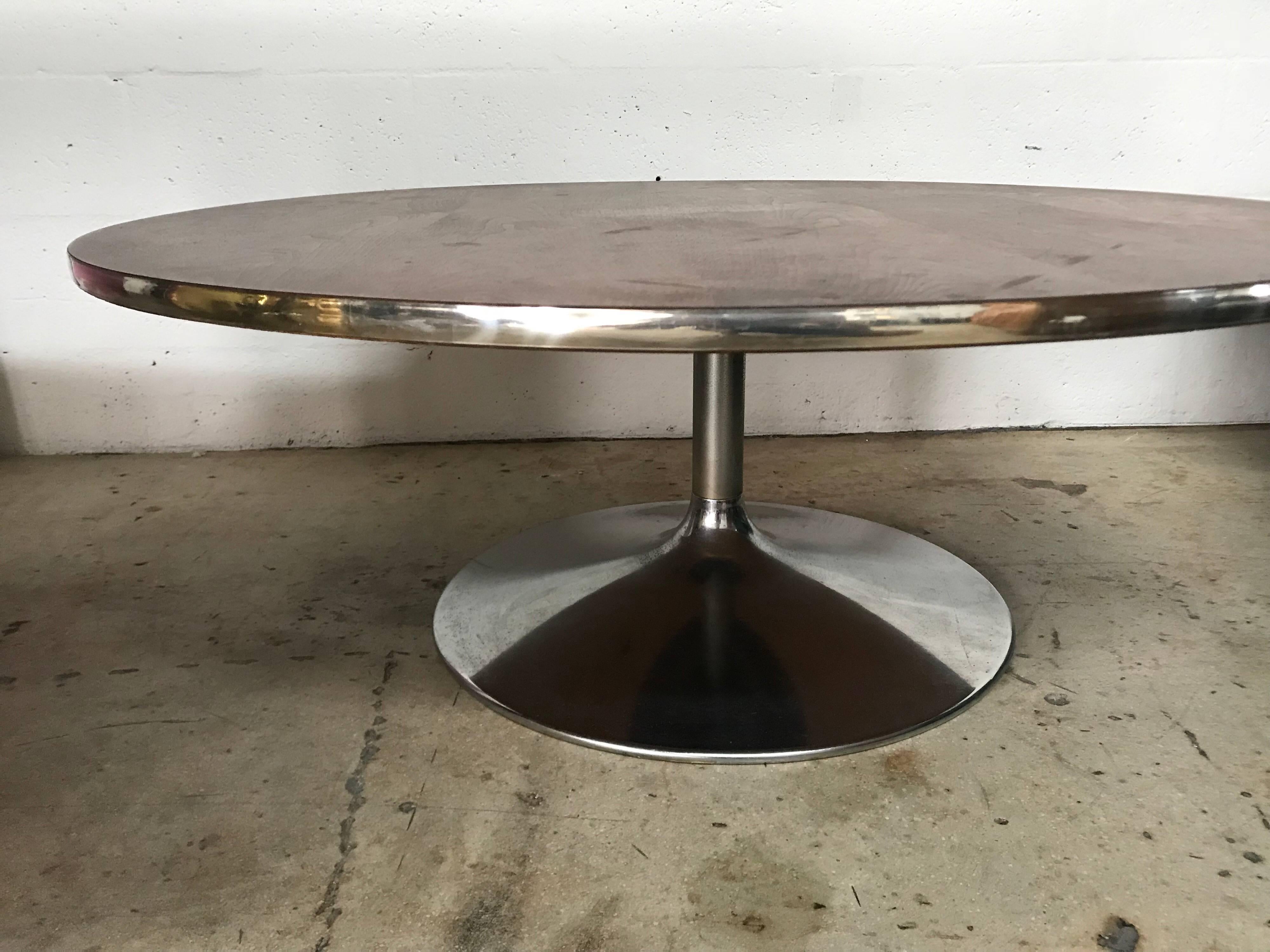 Tulip coffee or cocktail table rendered in walnut with a chrome base by Lane