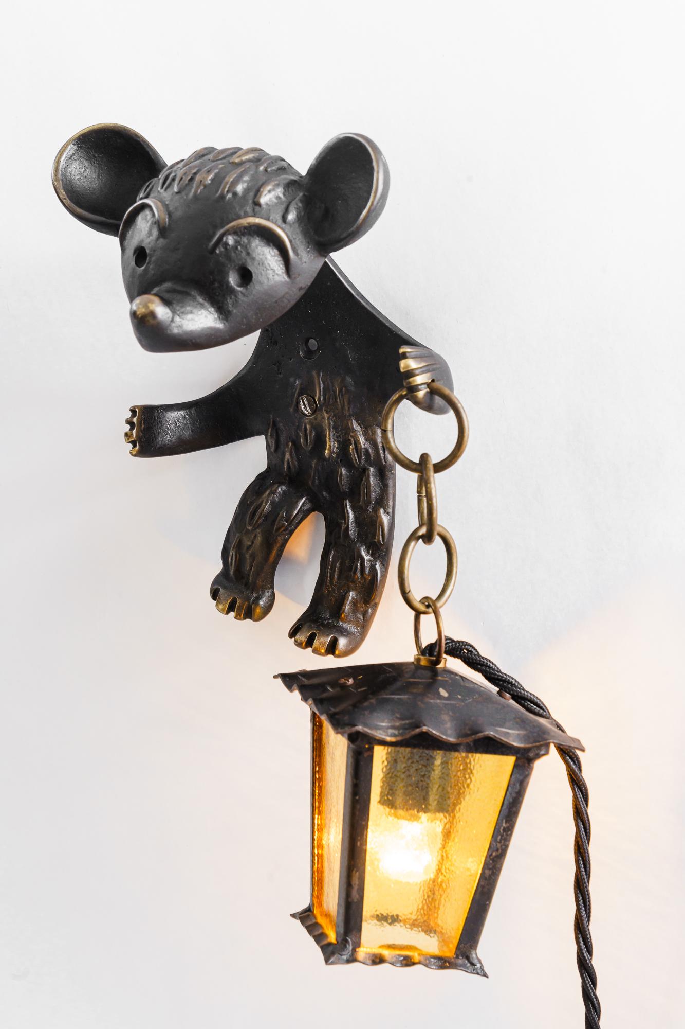Mid-20th Century Rare walter bosse for hertha baller bear wall lamp holding a lantern vienna 1950