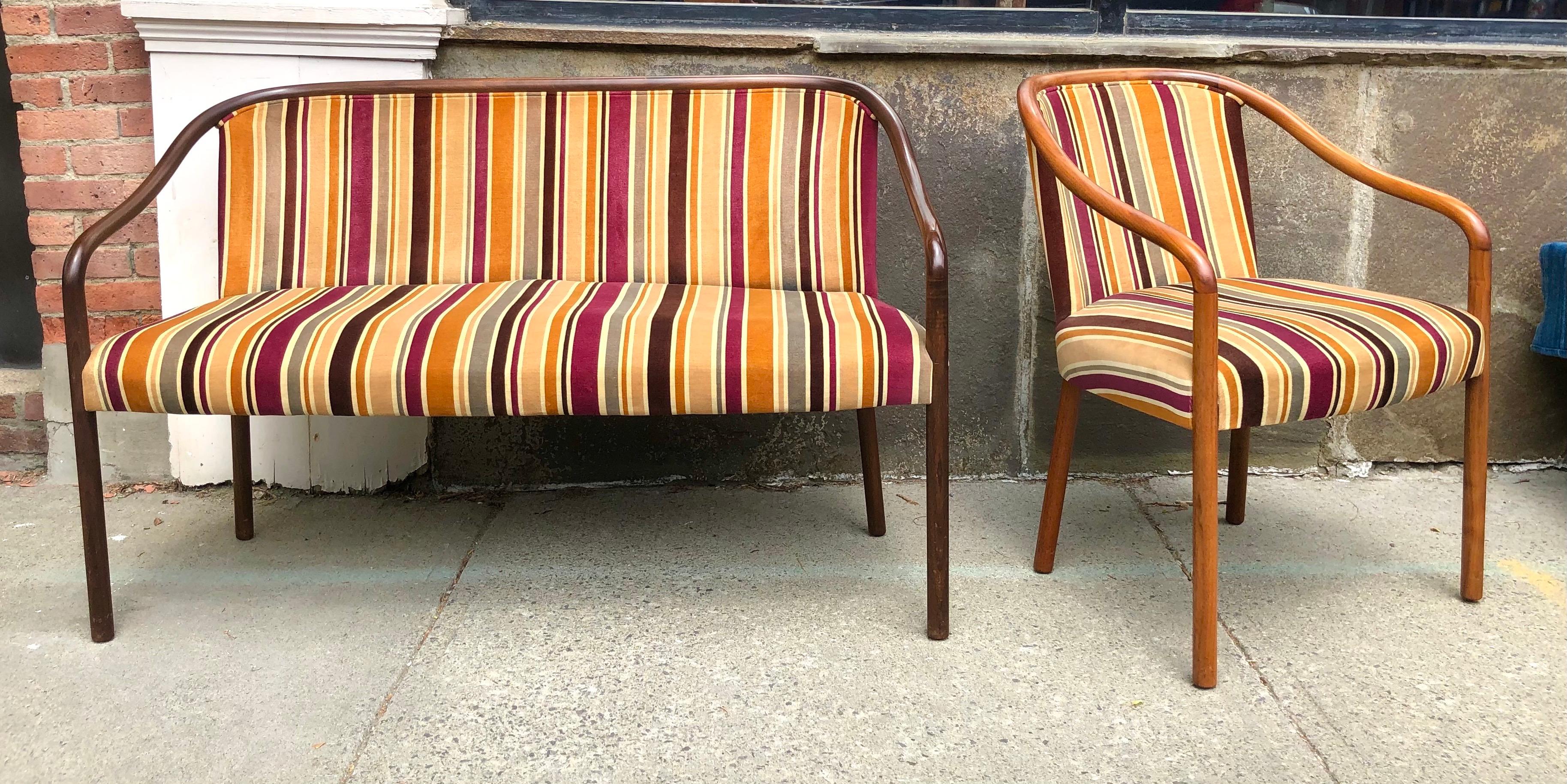 Bent ash frame with remarkably clean original mod striped cotton velvet upholstery. The chair frame is in a lighter stain wood but otherwise matches. Chair is 23