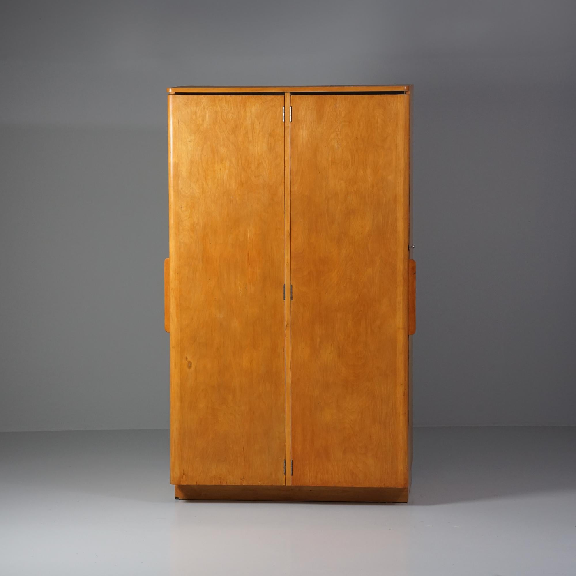 Rare wardrobe by Alvar Aalto for the Varkaus Hospital. Manufactured by Oy Huonekalu- ja Rakennustyötehdas Ab, 1940s. Birch and birch plywood. Completely restored. Gorgeous condition, patina consistent with age and use. The wardrobe has been