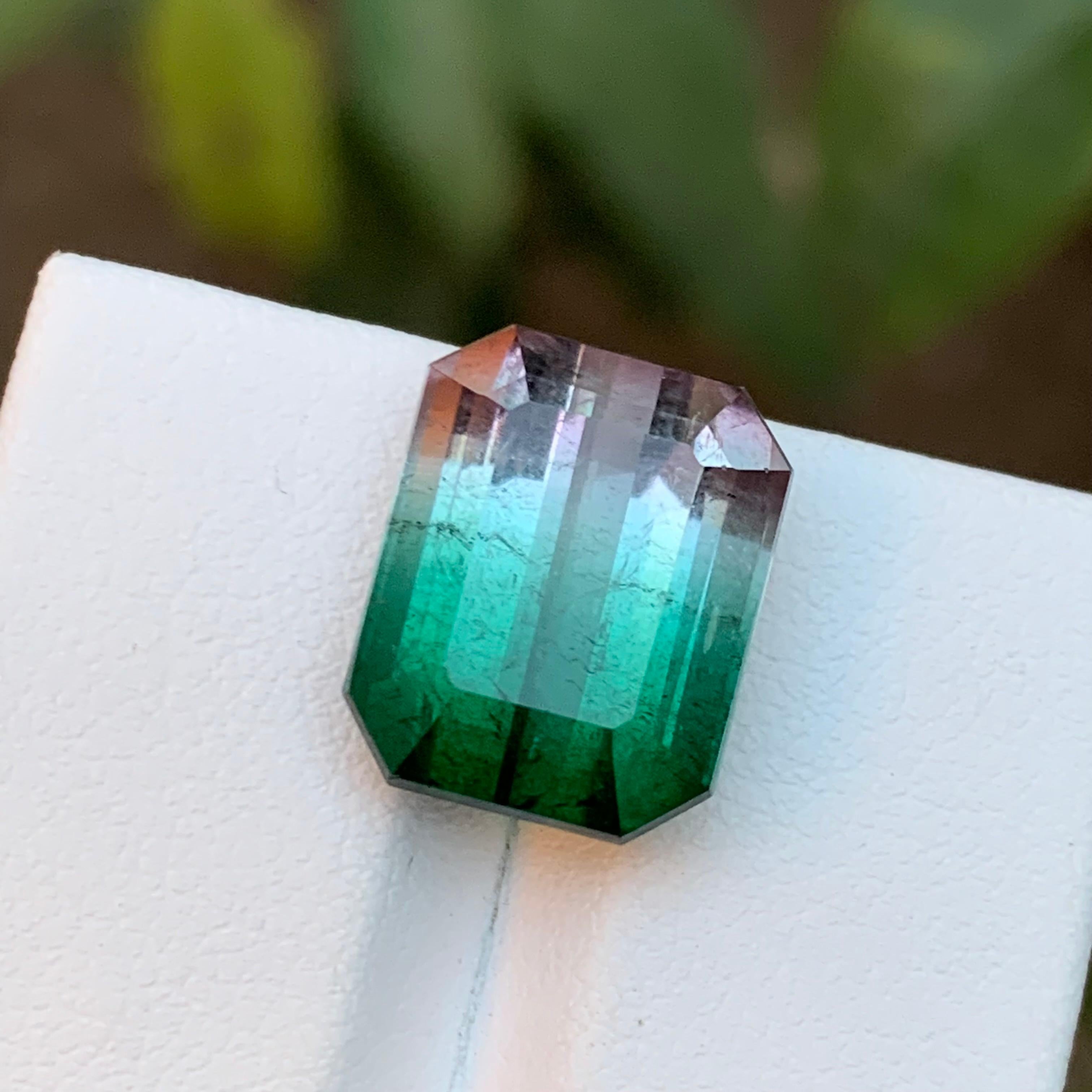 GEMSTONE TYPE: Tourmaline
PIECE(S): 1
WEIGHT: 13.15 Carat
SHAPE: Emerald
SIZE (MM): 14.20 x 11.30 x 9.12
COLOR: Watermelon Bicolor Bluish Green & Pink
CLARITY: Slightly Included 
TREATMENT: Heated
ORIGIN: Afghanistan
CERTIFICATE: On