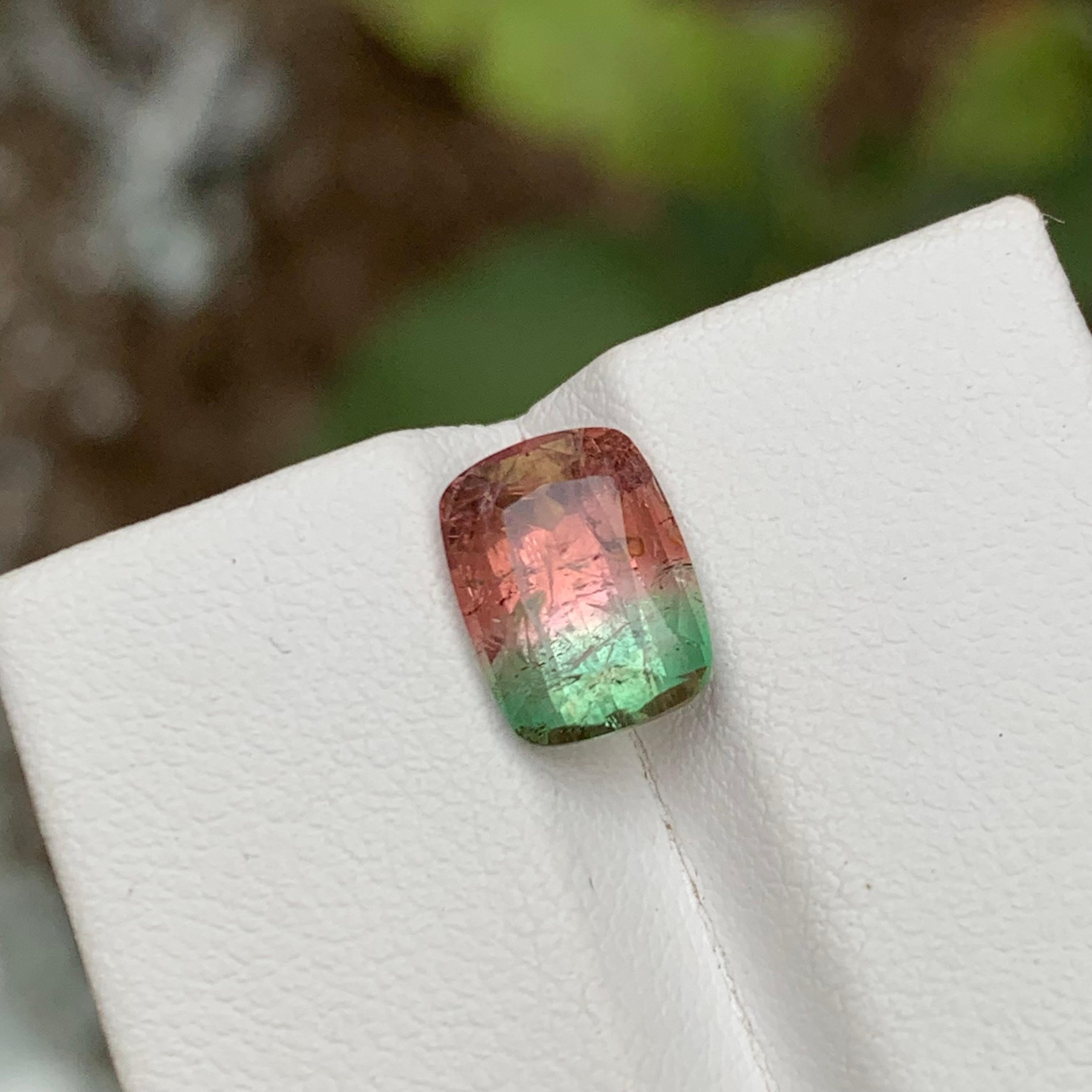 GEMSTONE TYPE: Tourmaline
PIECE(S): 1
WEIGHT: 3.05 Carats
SHAPE: Cushion 
SIZE (MM): 9.67 x 7.12 x 5.79
COLOR: Watermelon Bicolor
CLARITY: Moderately Included 
TREATMENT: Heated
ORIGIN: Afghanistan
CERTIFICATE: On demand

Introducing a breathtaking