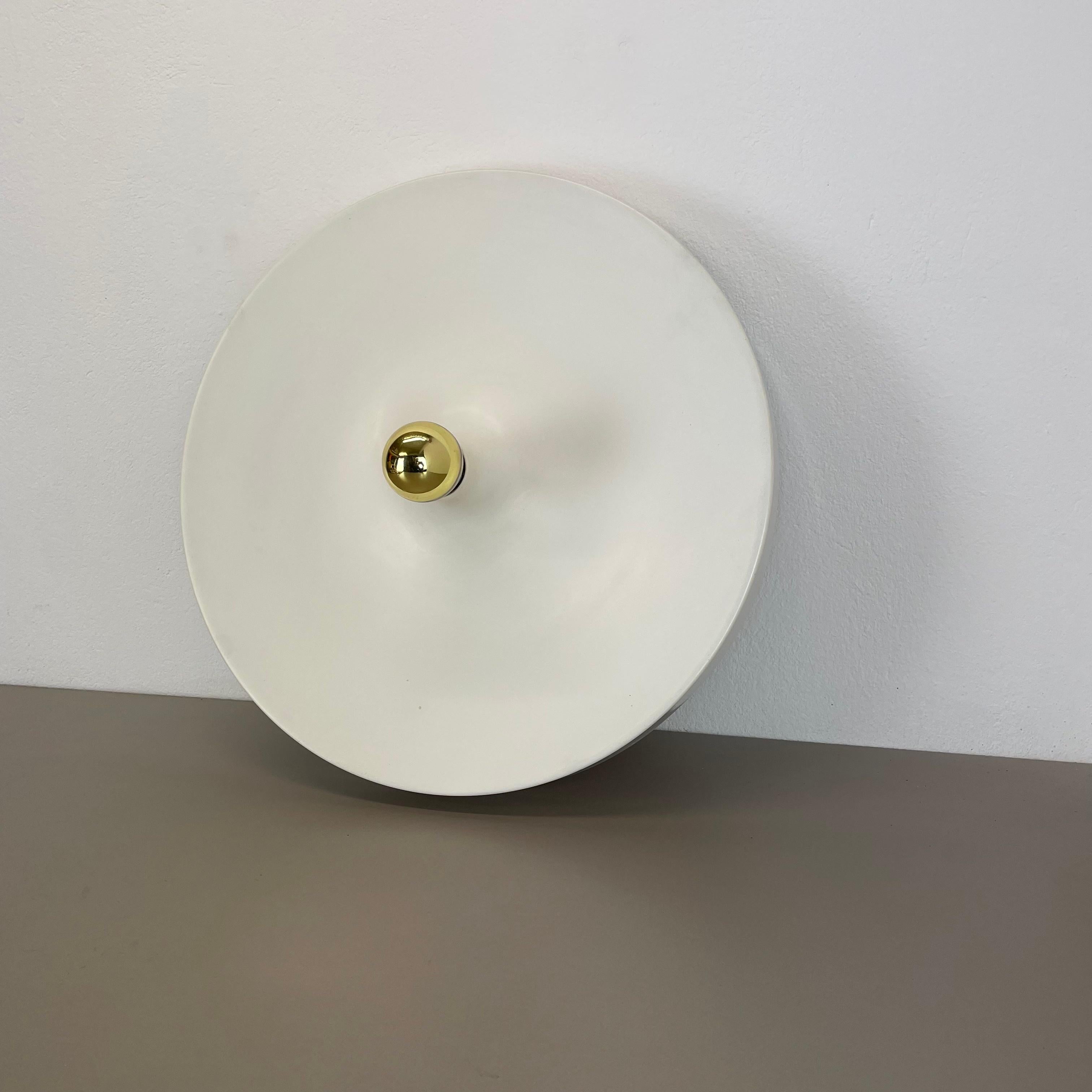 Article:

Extra-large wall light sconce


Producer:

Staff lights



Origin:

Germany



Age:

1970s



Description:

Original 1970s modernist German wall light made of solid aluminium metal. This super rare wall light was