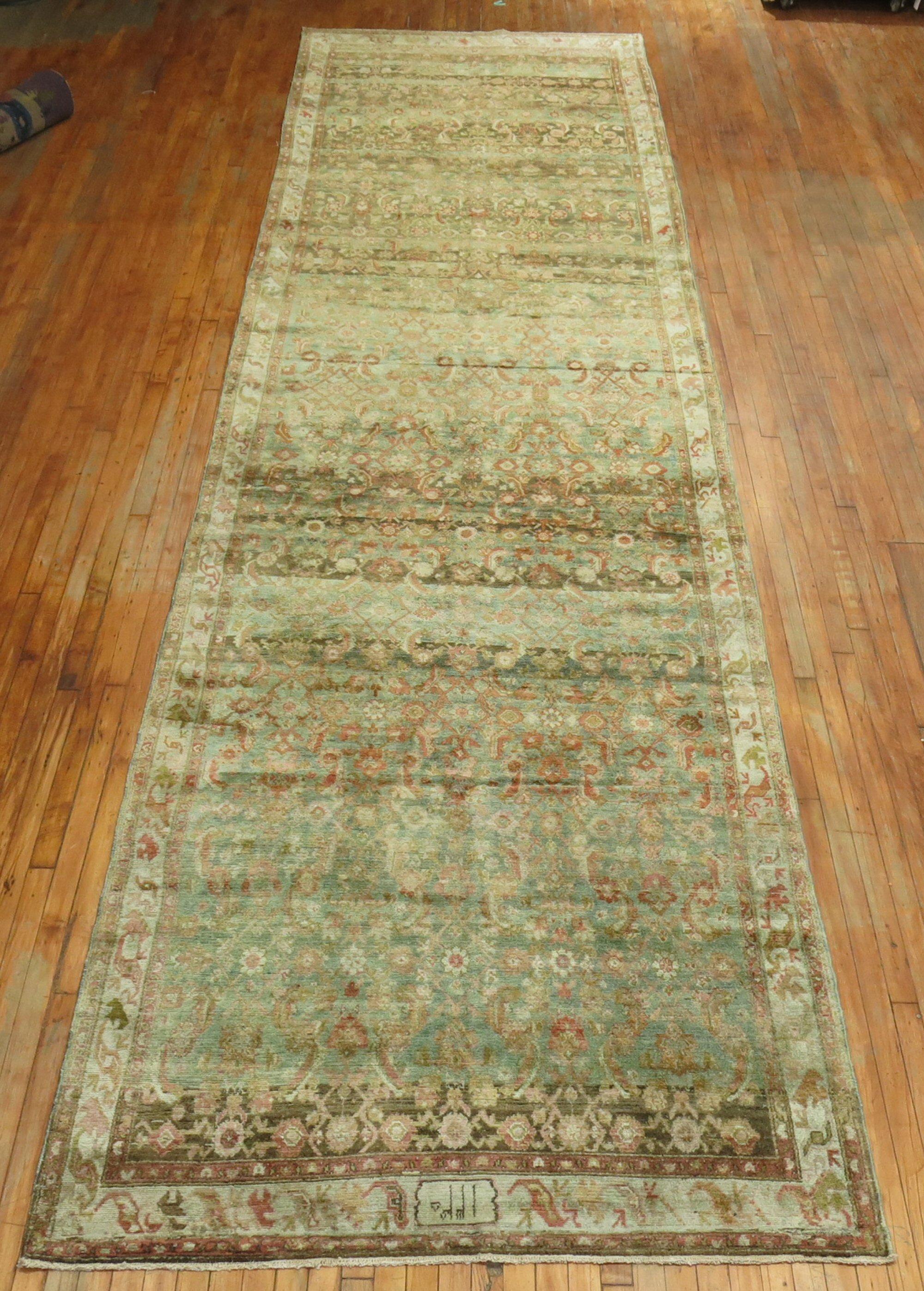 Stunning Persian Malayer rug from the early 20th century with a green field color, accents in terracotta, pink and brown.
Don't recall ever seeing size on a runner from this village before.

Measures: 5'2