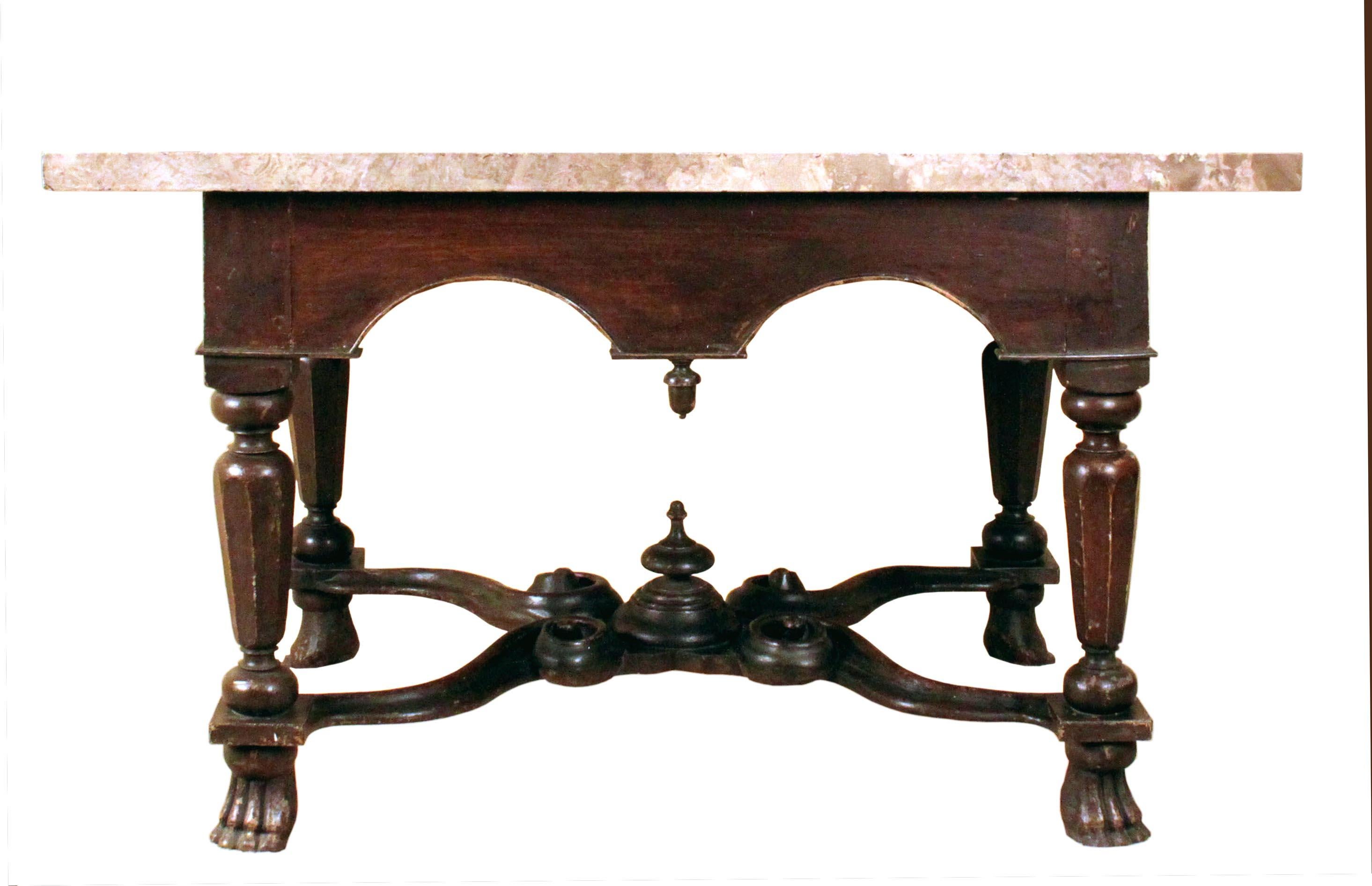 A very rare William & Mary pier table in the manner of Daniel Marot: shaped friezes on three sides and a scrolling X stretcher with braganza feet: in its original simulated grained oak paint and with a fine but associated marble top. This was