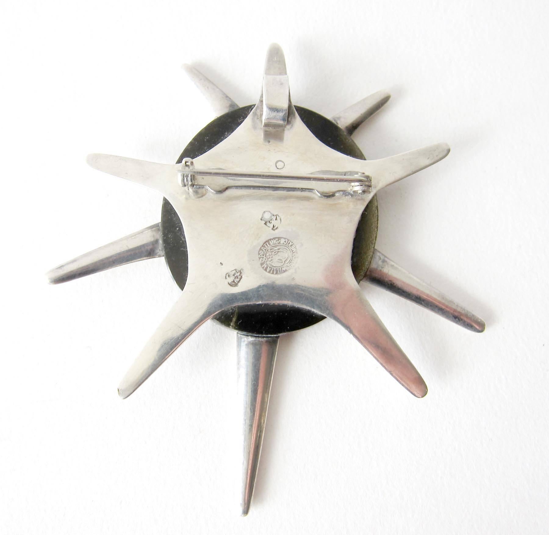 1950's Sterling silver with green obsidian star pendant or brooch created by William Spratling of Taxco, Mexico.  Pendant measures 3.25
