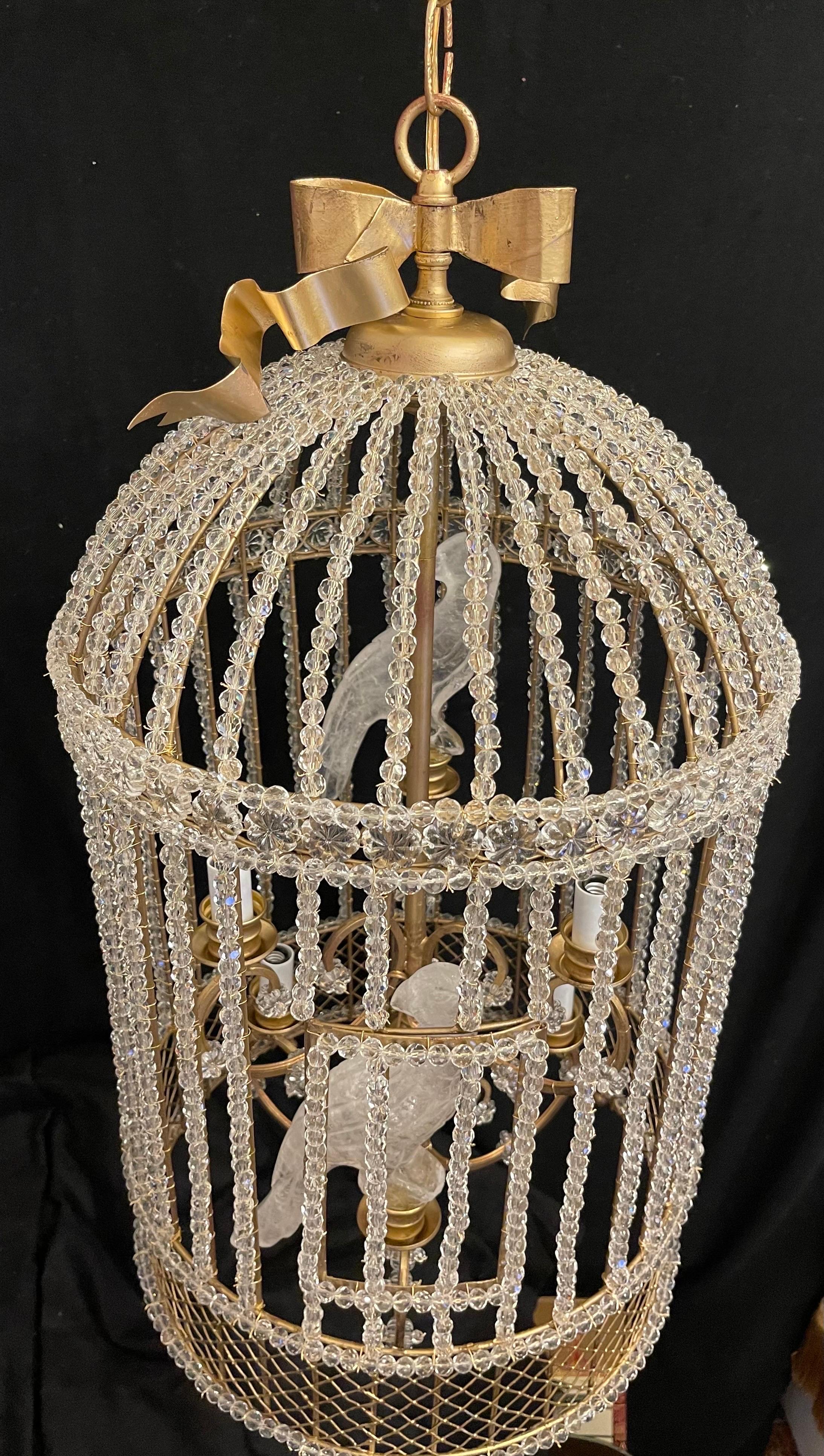 A Wonderful French Louis XVI, In The Manner Of Maison Baguès Style Gold Gilt & Crystal Beaded Bird Cage Form Chandelier Housing Two Tiers Of 4 Candelabra Lights With Alternating Rock Crystal  Parrots / Birds.  
