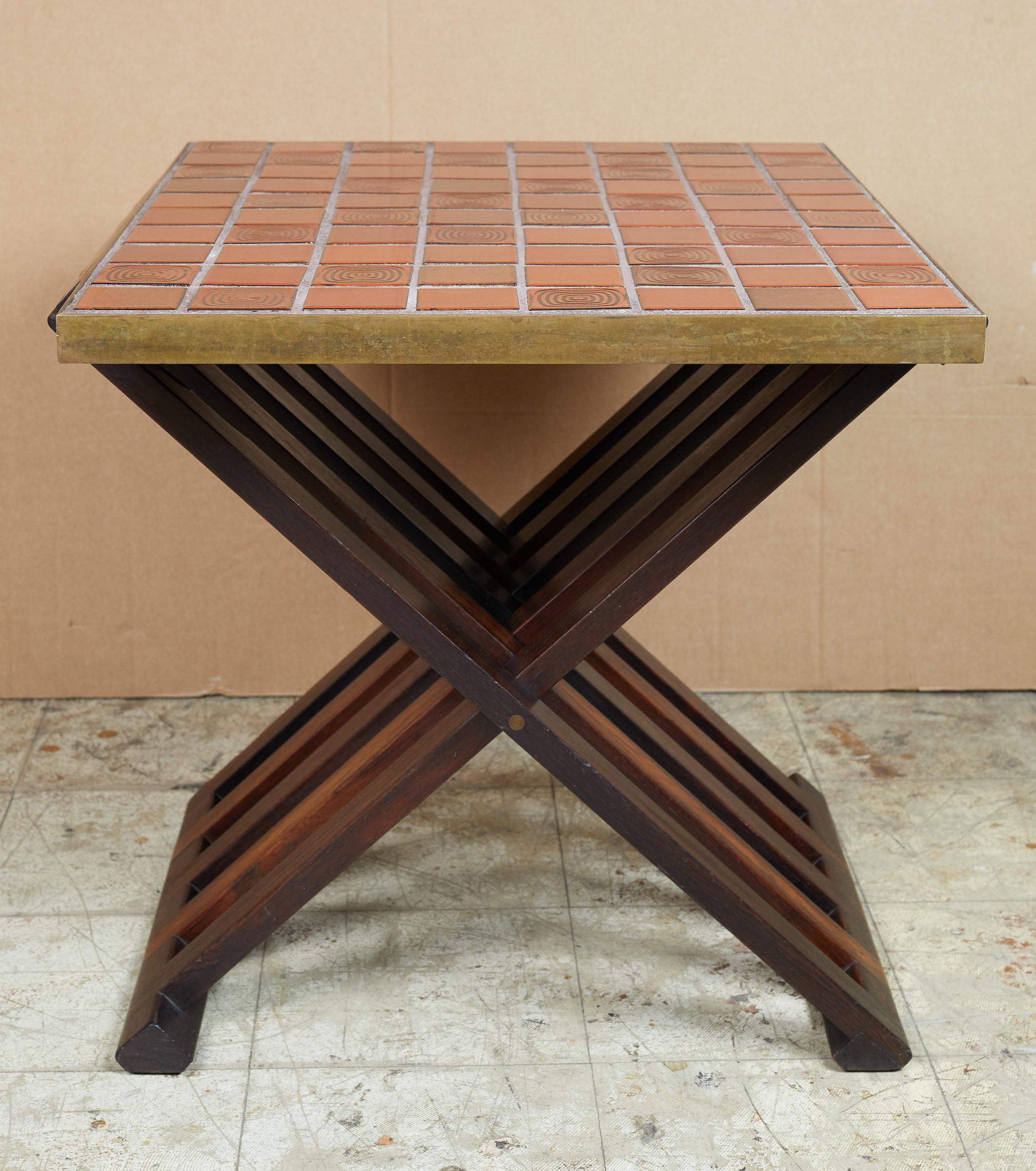 Rare wood X-form folding tile top table by Edward Wormley for Dunbar.
 Ceramic top by Gertrud and Otto Natzler.