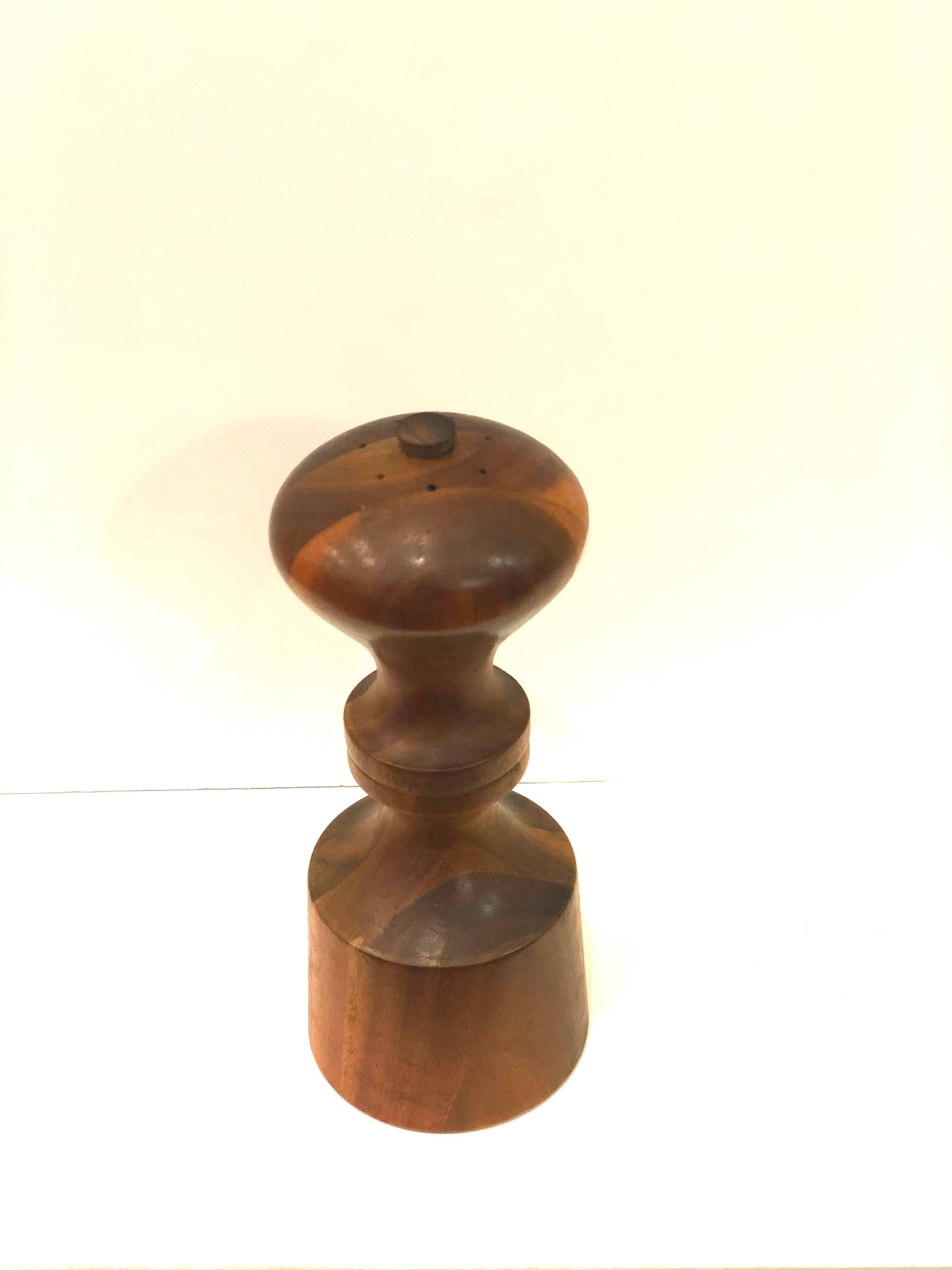 Early production and rare woods, on this salt and peppermill designed by Quistgaard for Dansk, beautiful design. I believe its in cheerywood with the early ducks stamped never seen this one.