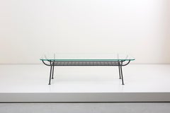 Raro tavolino in ferro battuto con piano in vetro di George Nelson per Arbuck