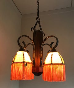 Rare Wrought Iron and Wood Pendant Light Fixture with Leather Shades and Fringes