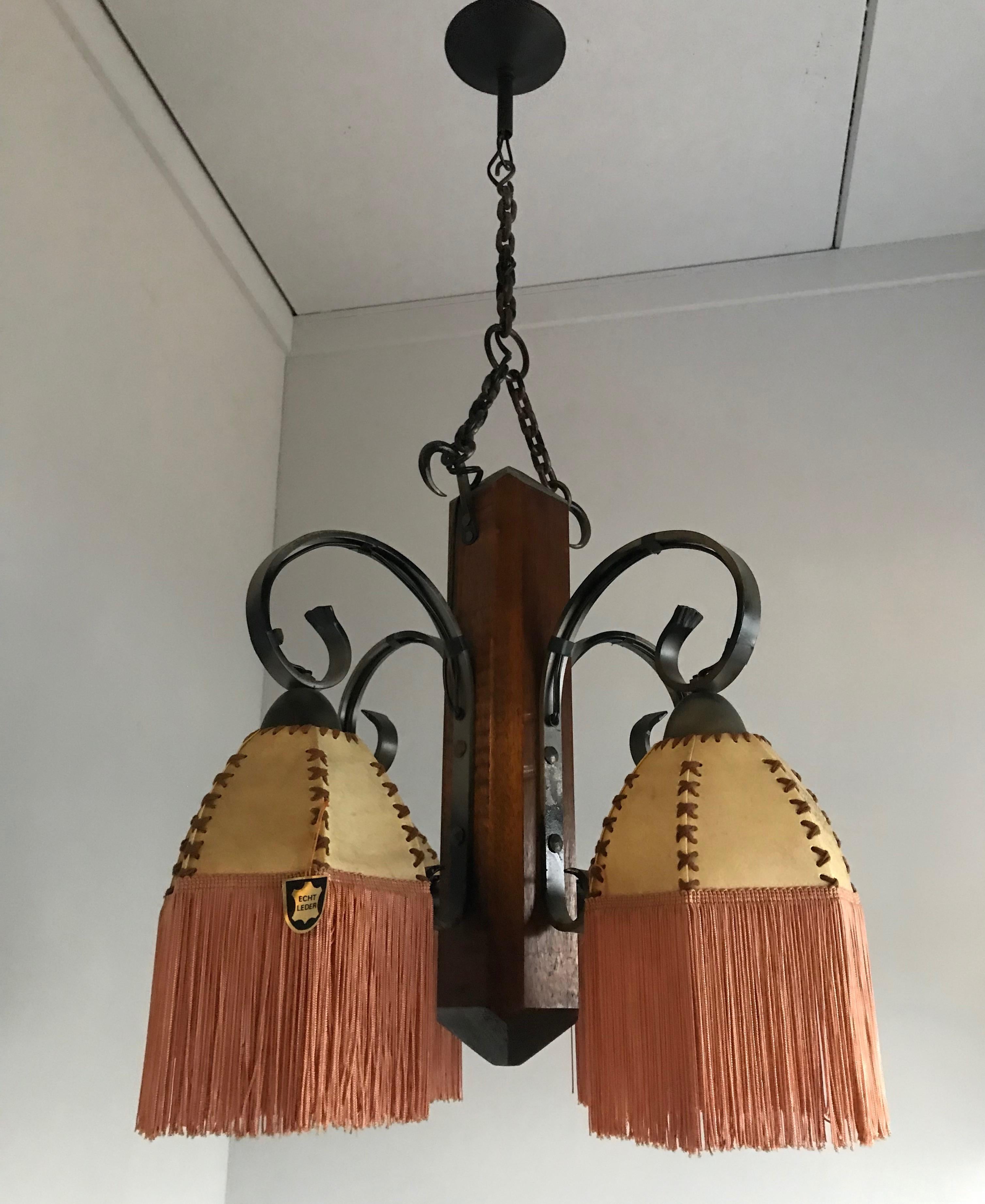 European Rare Wrought Iron and Wood Pendant Light Fixture with Leather Shades and Fringes For Sale