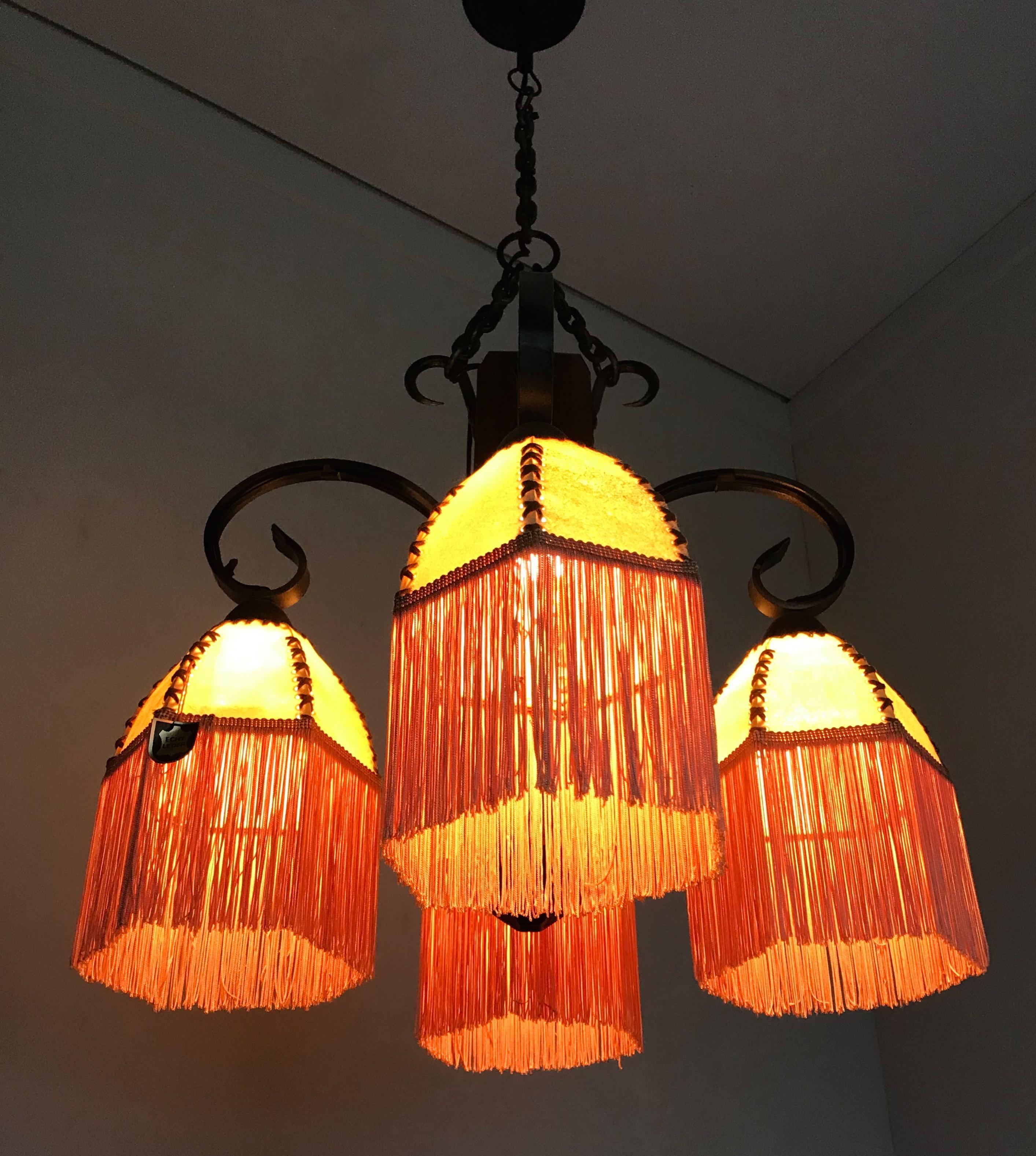 Hand-Crafted Rare Wrought Iron and Wood Pendant Light Fixture with Leather Shades and Fringes For Sale