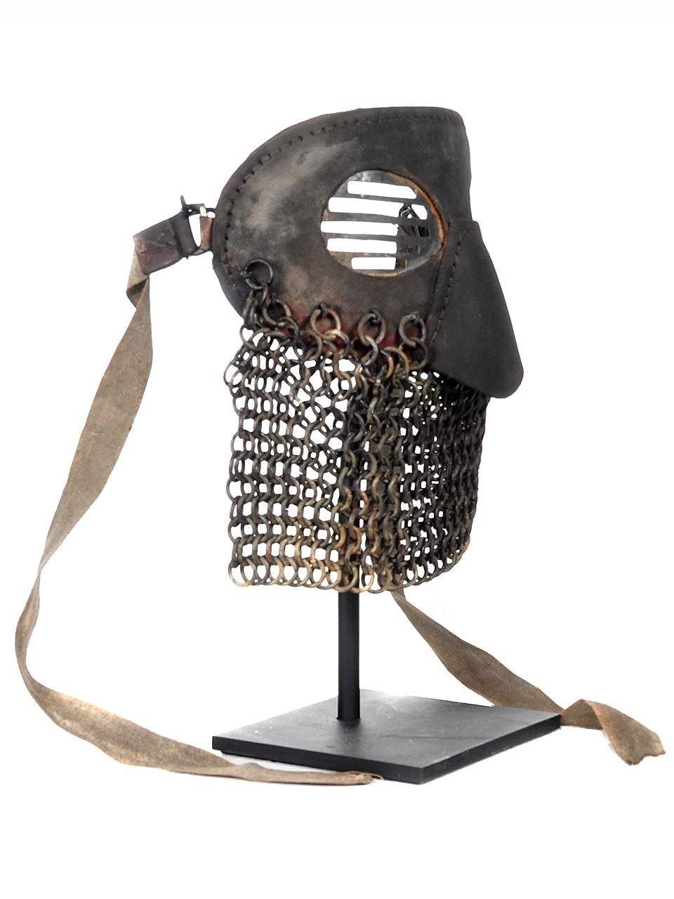 Europe, England, World War I era, ca. 1917 to 1918. Fascinating piece of militaria created to protect the crew of the earliest tanks that rolled onto the WWI battlefields of France and Belgium in 1917. Called a splatter or splinter mask, this