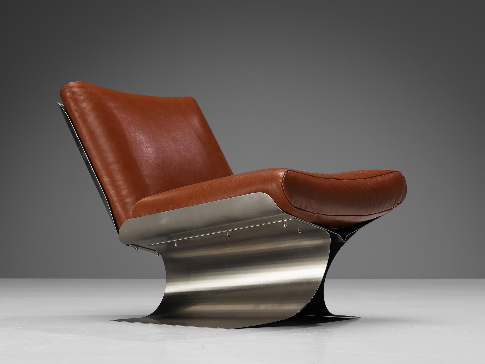 Xavier Féal, lounge chair, brushed steel, leather, France, ca. 1970

Rare lounge chair designed by French interior architect Xavier Féal in the 1970s. The smooth and sculptural chair is made of brushed steel, Féals signature material. The base has a