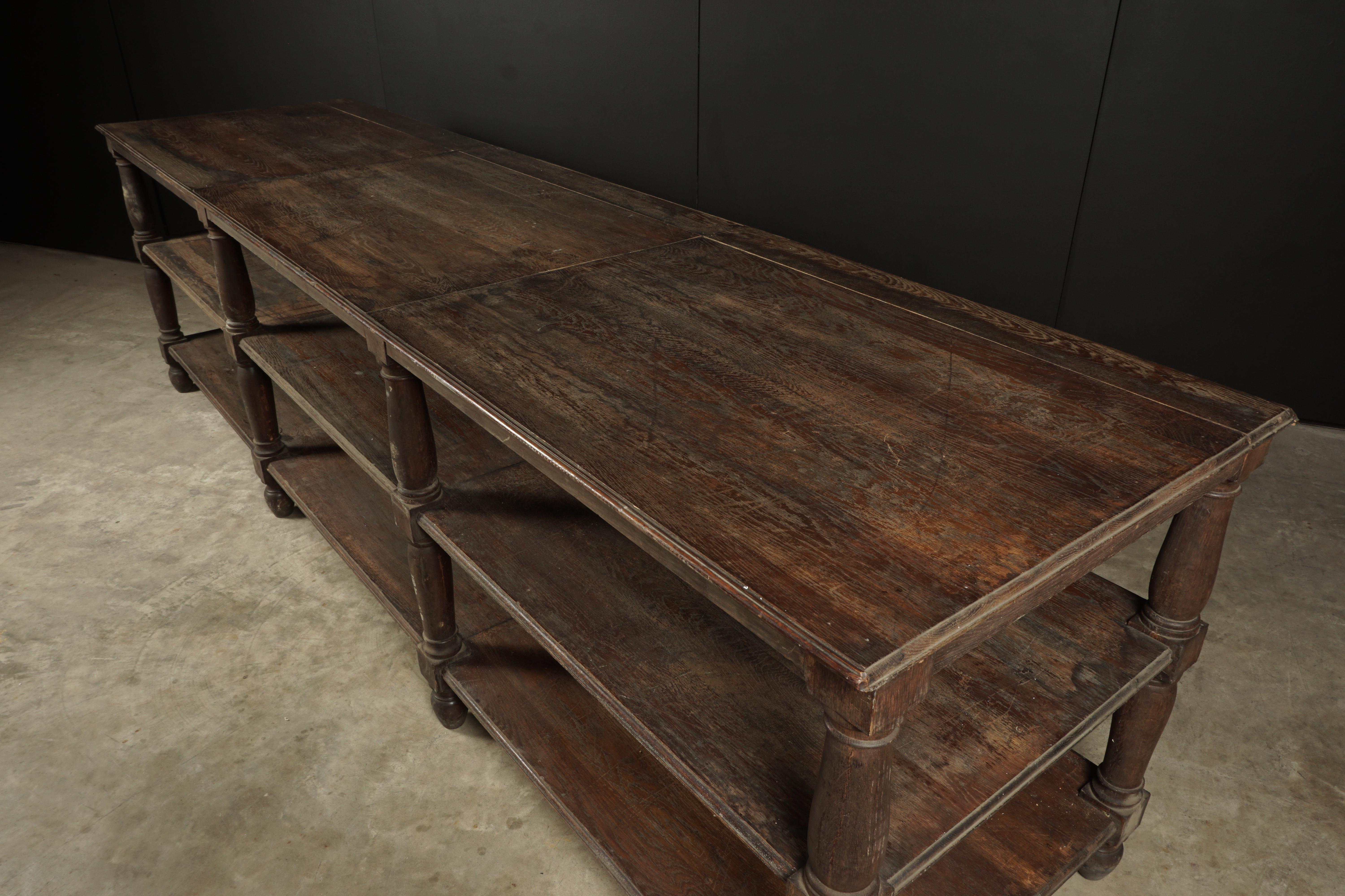 Rare extra large draper table from France, 1890s. Solid oak construction with great color and patina.