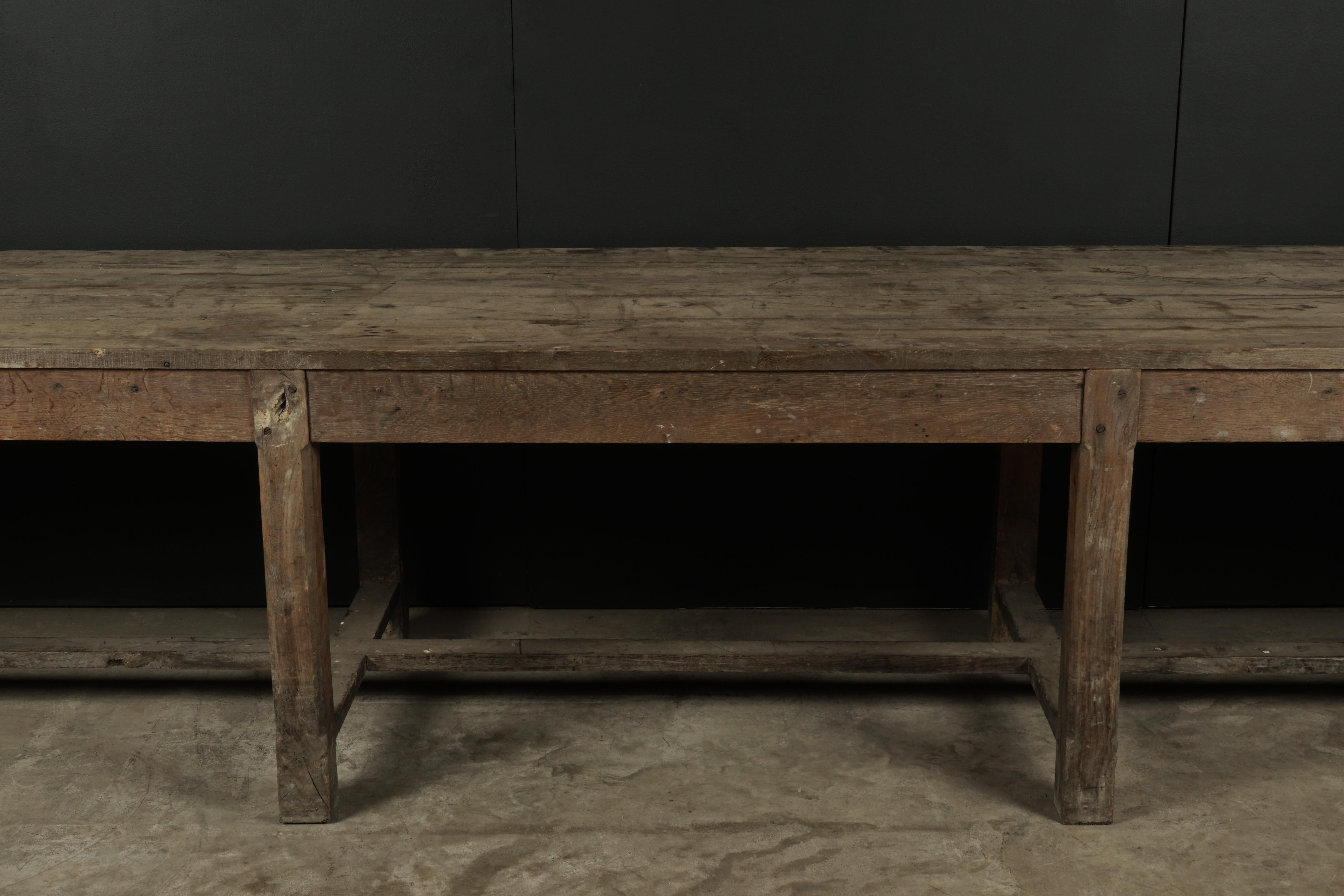 Rare very large solid oak dining table from France, circa 1920. Heavy oak construction with very nice feeling and patina. Unusual size, most likely from a convent.