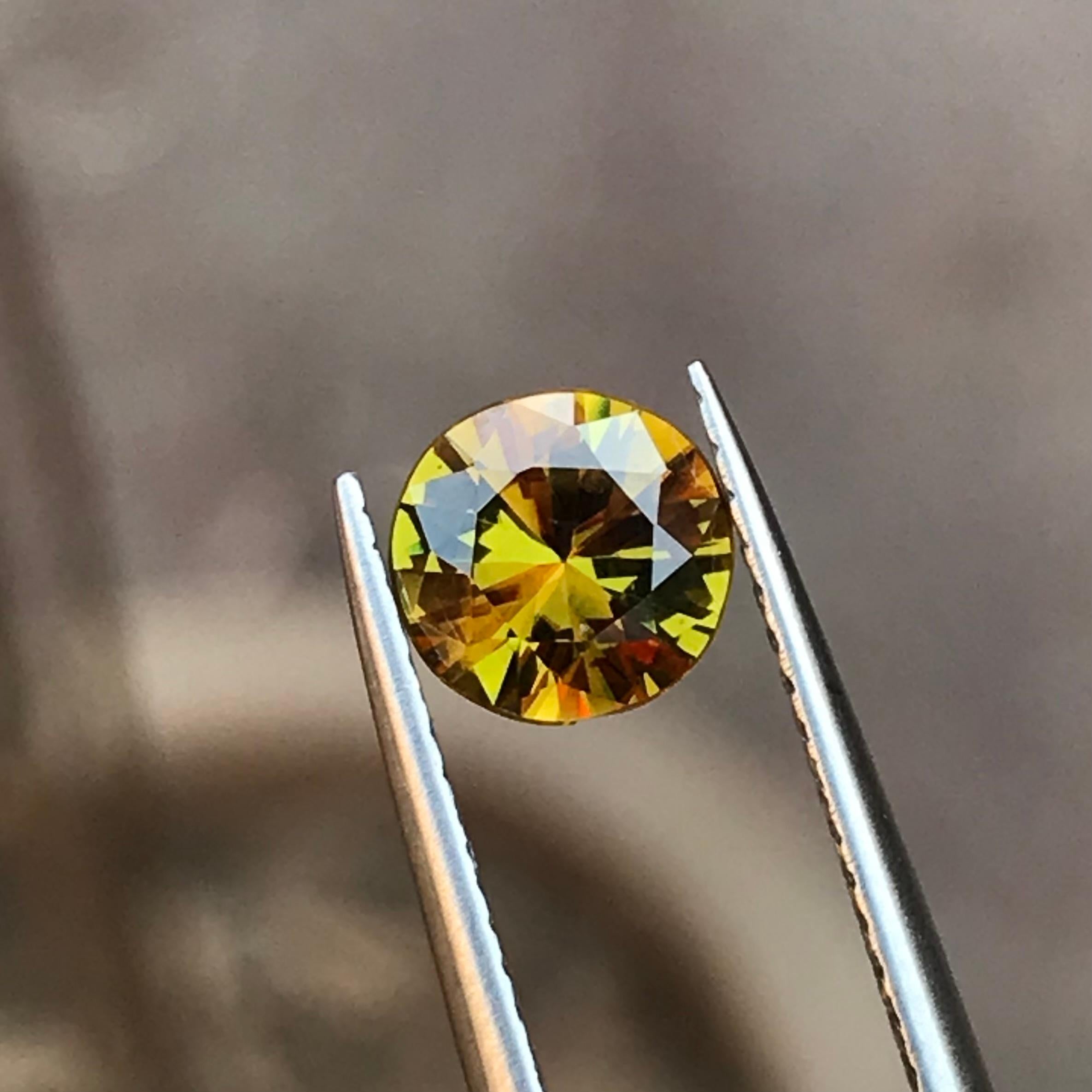 Contemporary Rare Yellow Natural Sphene Loose Gemstone, 1.05 Ct Round Brilliant for Ring For Sale