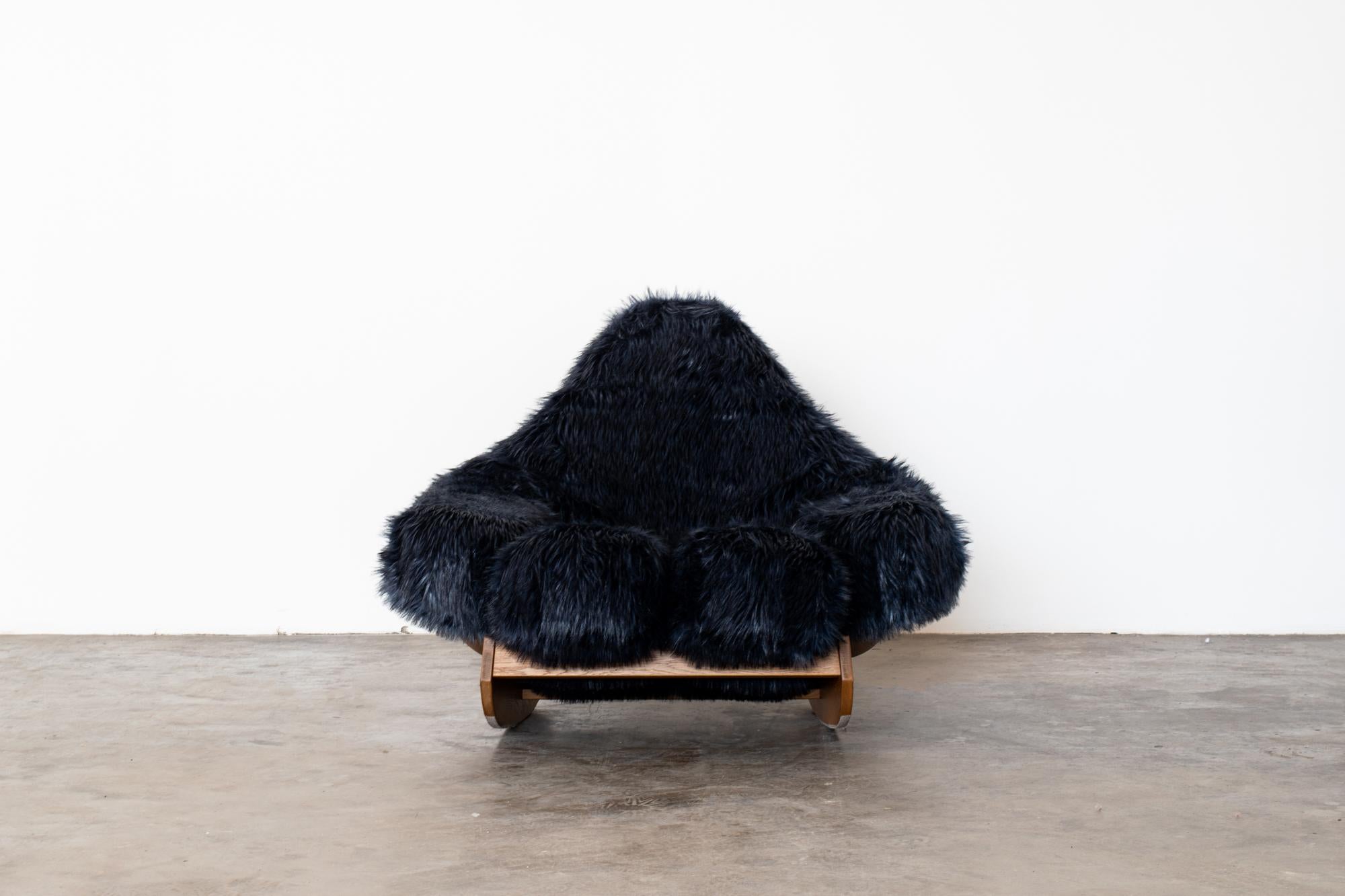 MARIO SCHEICHENBAUER
Rare Pop culture Yeti rocking chair for Elam, Italy - 1968. 
Oakwood frame, synthetic fur upholstery.
Depth 128 x Width 116 x Height 91  cm

This rare Abominable Snowman 'Yeti' rocking chair dating with its structure hosting a