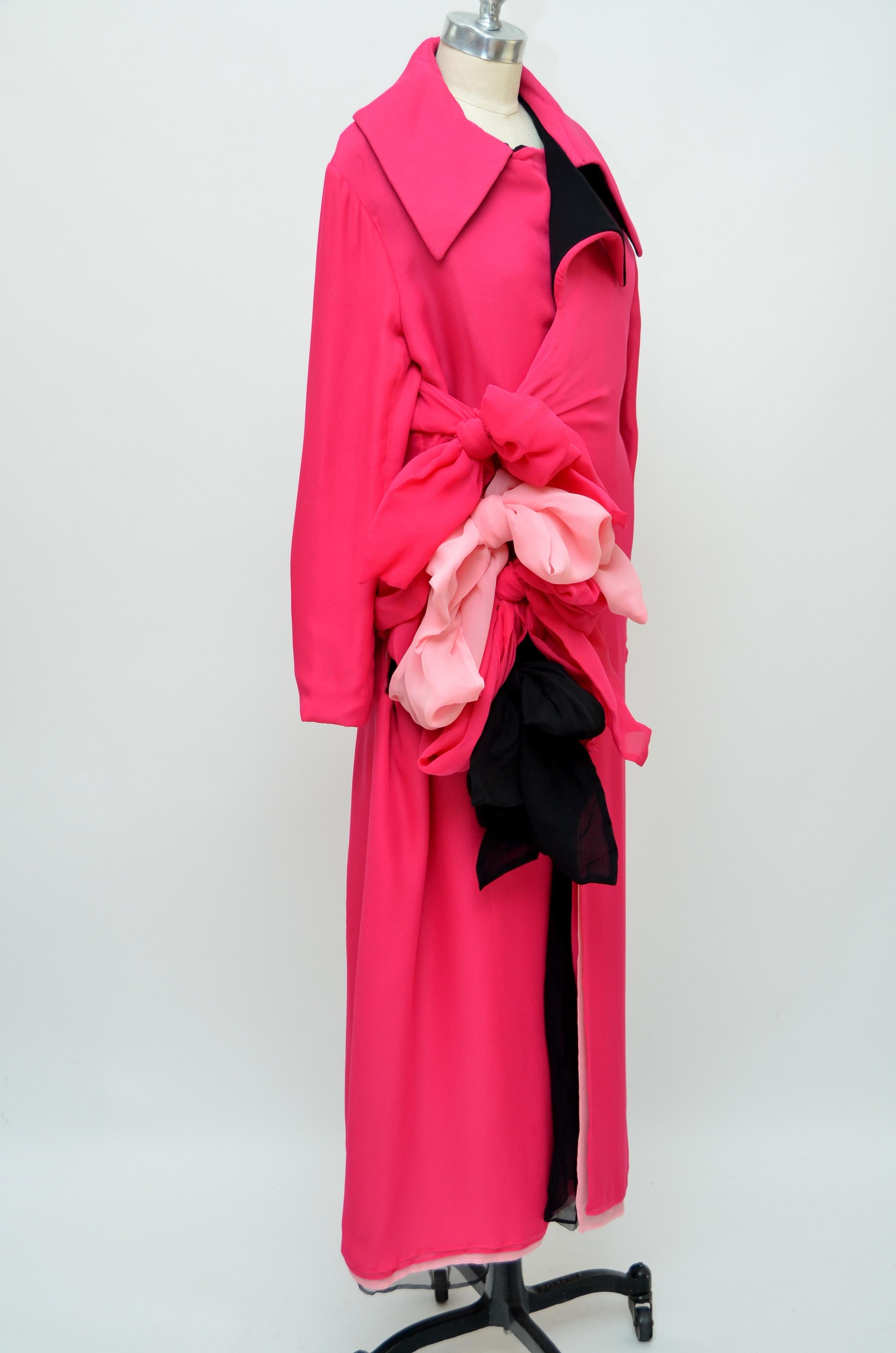 Yohji Yamamoto runway 2005 pink  fuchsia silk coat dress .
Made of multiple layers of silk tied together with sash tie  bow's  in the front.
Size 3.
Condition:looks new, possibly never worn.Fabric looks new.

This piece was photographed on mannequin