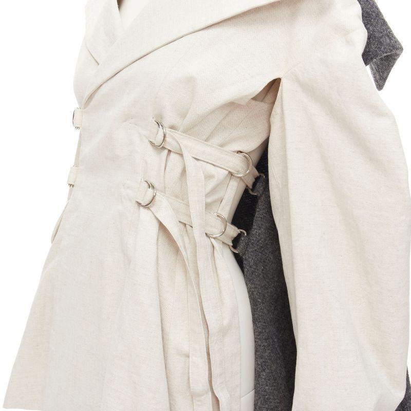 rare YOHJI YAMAMOTO Vintage 2006 Runway blue cross blanket cape  buckle jacket
Reference: CRTI/A00683
Brand: Yohji Yamamoto
Designer: Yohji Yamamoto
Collection: 2006 - Runway
Material: Cotton, Wool, Linen
Color: Grey, Multicolour
Pattern: