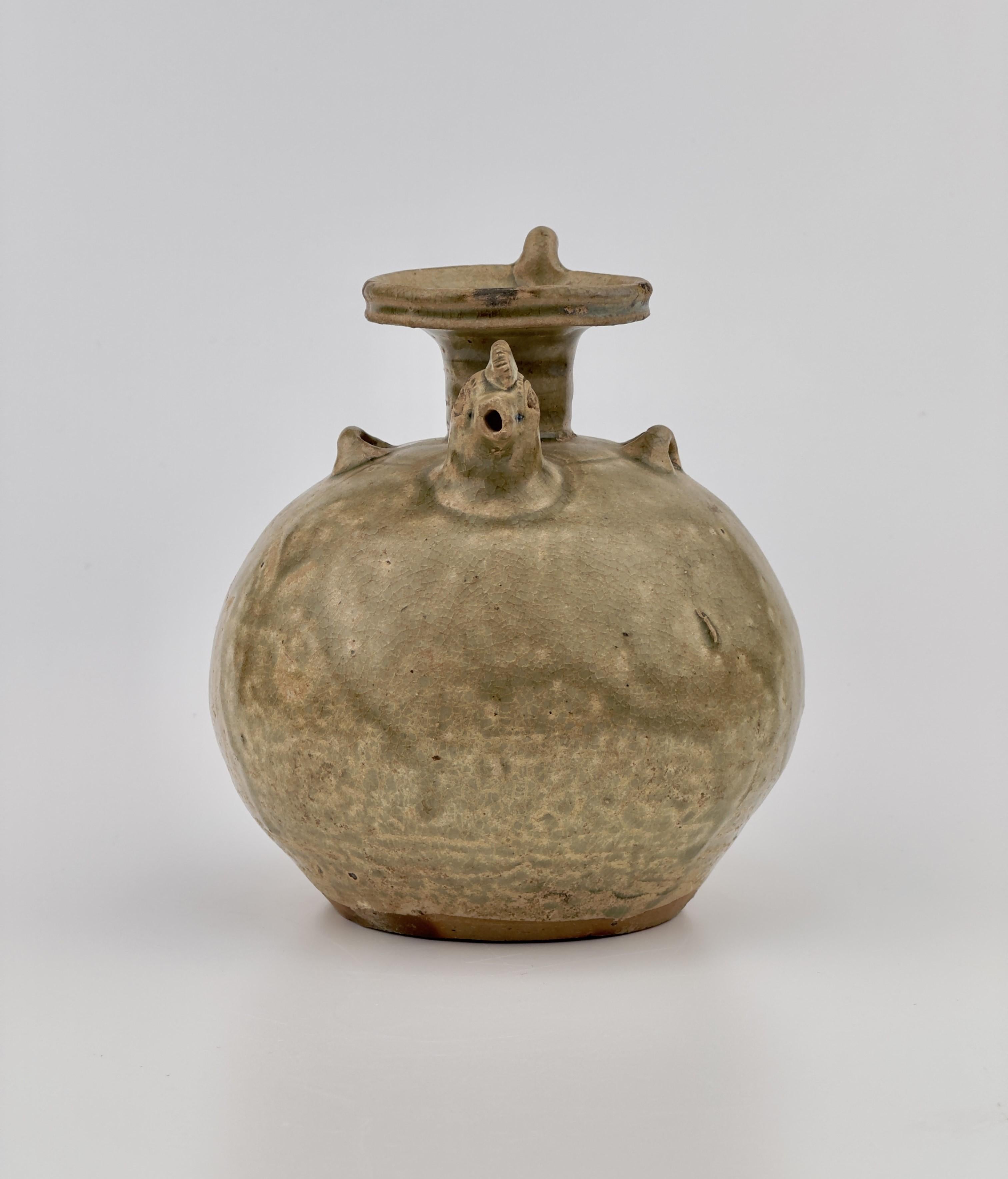 Chicken-head ewers are among the most distinct and emblematic pottery pieces from the dynamic yet innovative era spanning from the Han (206 BC - AD 220) to the Tang (618~907) dynasties. Their production commenced during the Jin dynasty (265~420) in