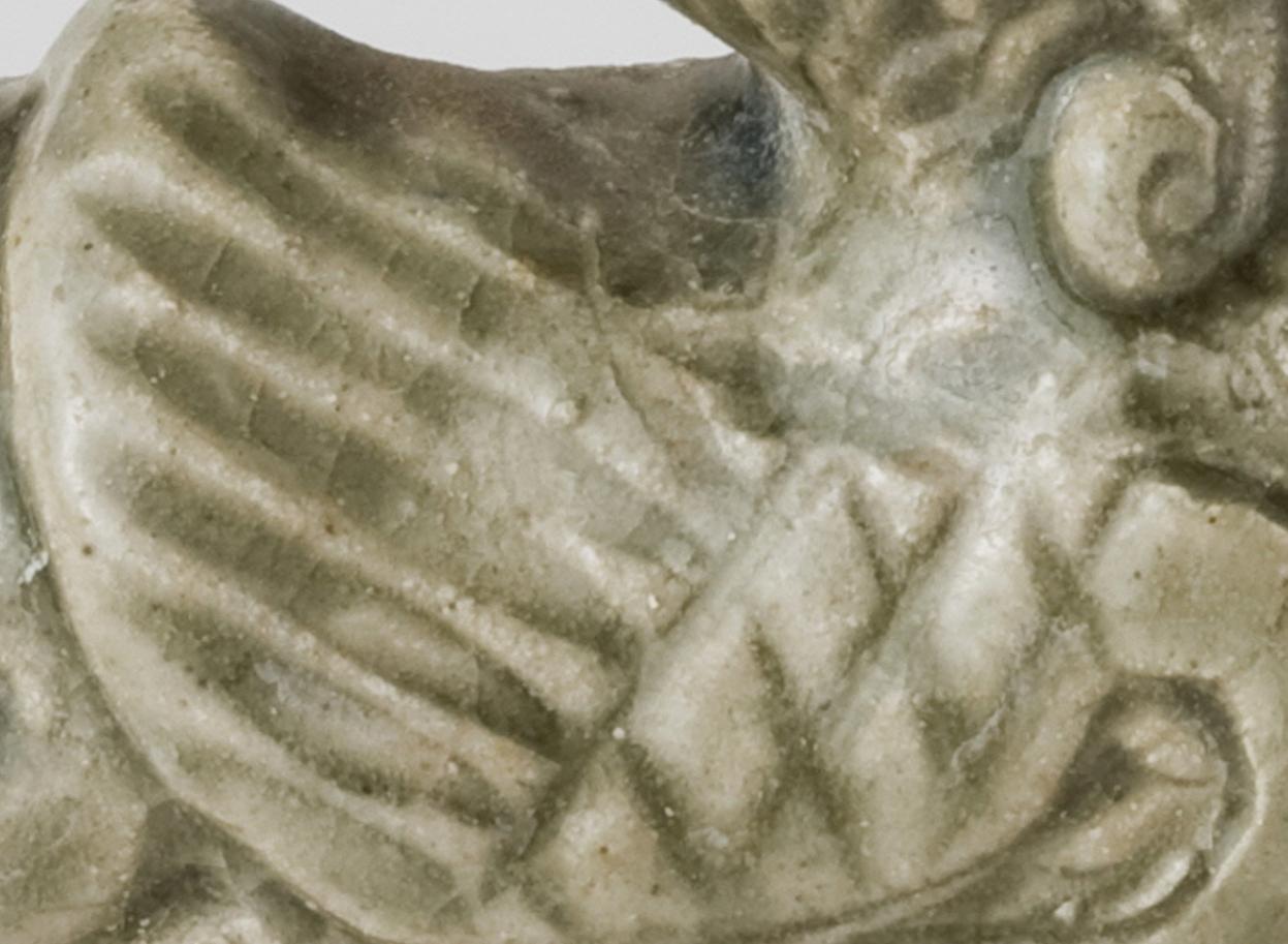 Céladon Rares statues de deux Haitai en céladon émaillé, dynastie des Jin de l'Ouest (265-420) en vente