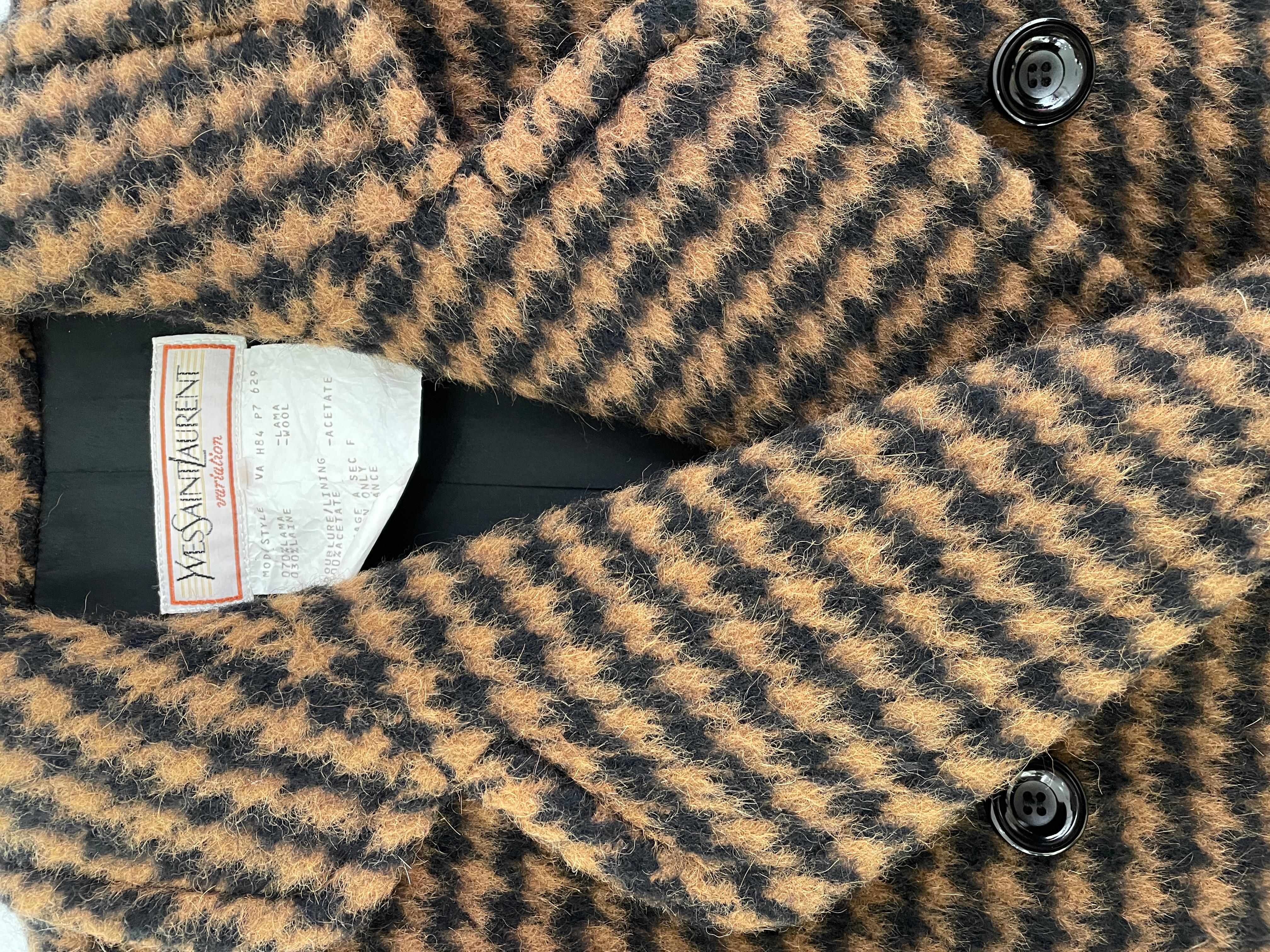 Amazing and super rare Yves Saint Laurent Lama Coat
1970s
Size: 36
Measures: sholulders 40cm length 105cm
Materials: 70% Lama 30% Wool
-
Perfect general condition.
A little imperfection inside (see pictures).
-
