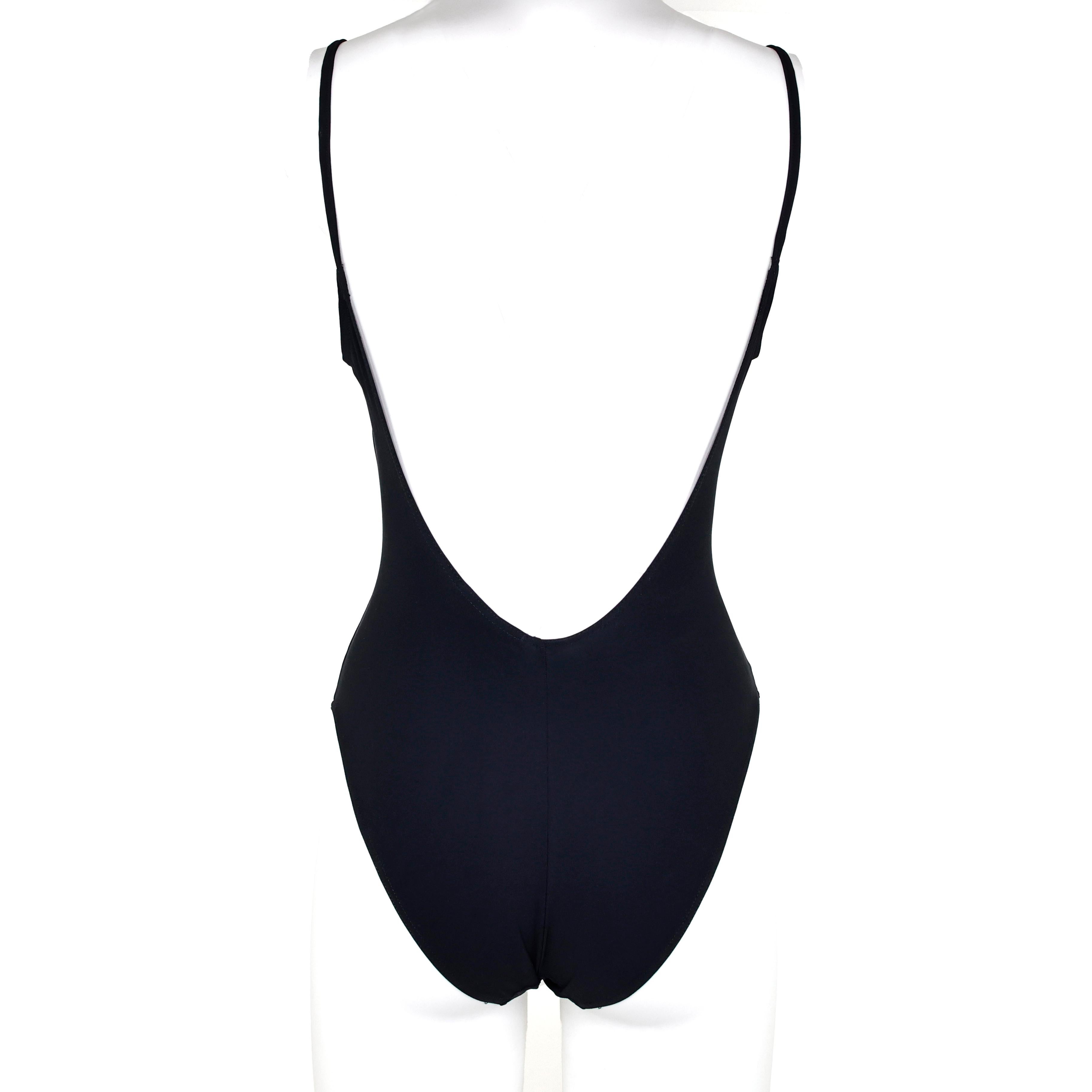 Yves Saint Laurent one-piece swimsuit / body in lycra color black crystal embellished YSL logo. Size 48 IT.

Condition:
Really good, vintage piece.
