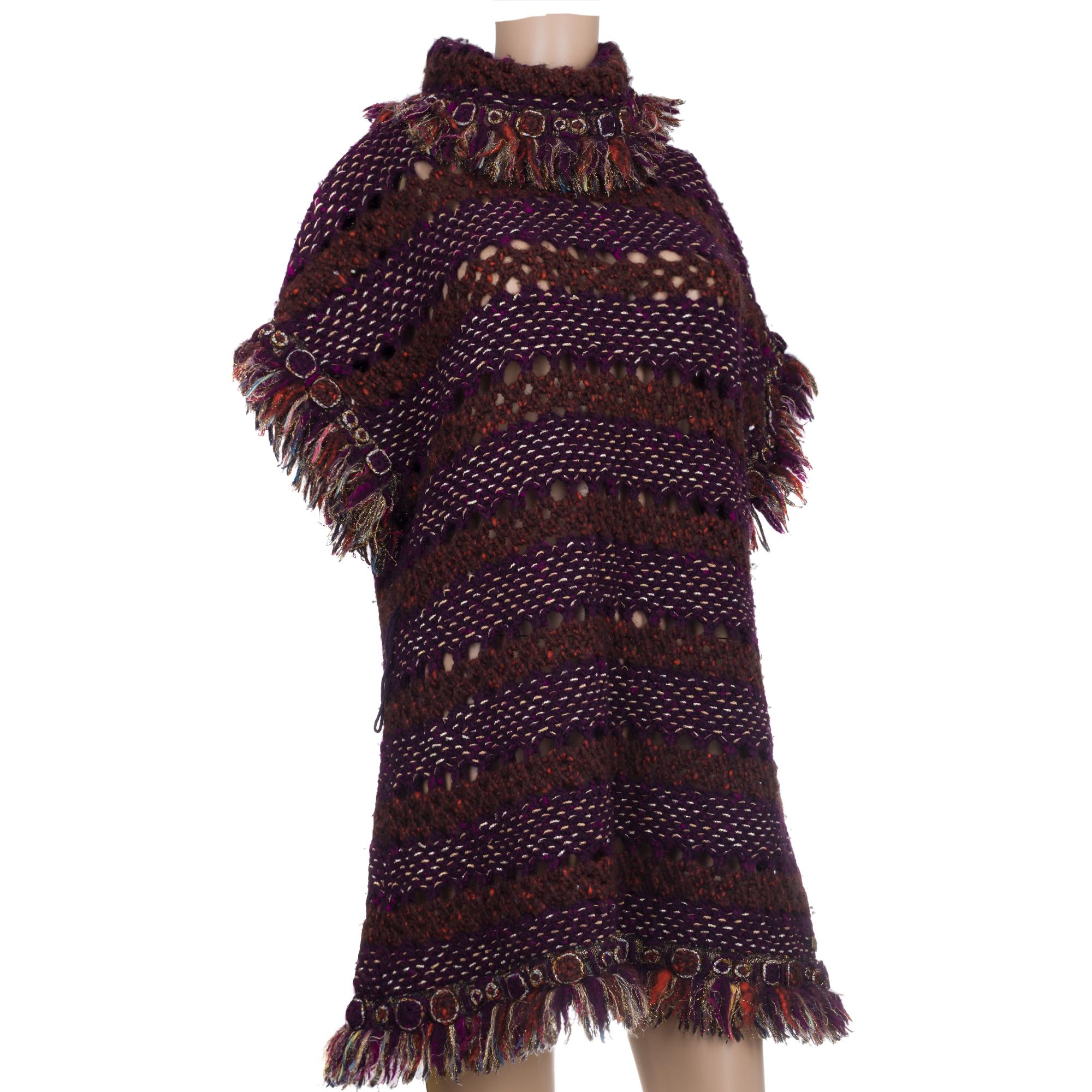 Chanel​ ​UNIQUE​ ​LESAGE​ ​Burgundy​ ​Gold​ ​Multicolor​ ​Tunic​ ​Sweater​ ​Dress​ ​with​ ​short​ ​sleeves,​ ​metallic​ ​multicolor​ ​gold-tone​ ​fringe​ ​trim​ ​throughout​ ​and​ ​Gold​ ​CC​ ​logo.​ ​From​ ​the​ ​Pre-​ ​Fall​ ​2011​ ​Paris-​