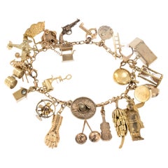 Rarely seen 1930's 14 Karat Yellow Gold Original Loaded Charm Bracelet