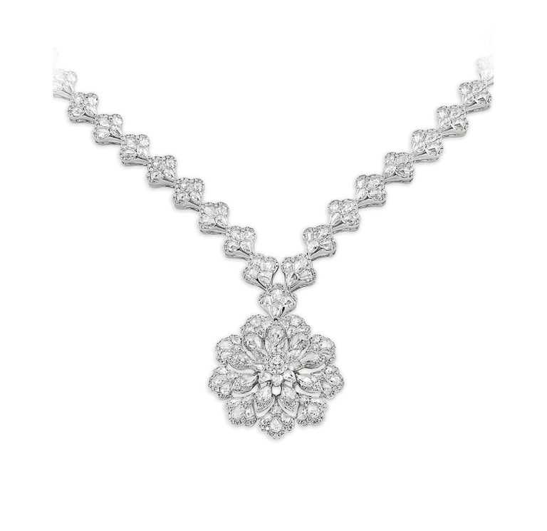 This unique and modern necklace from our High Jewelry Collection is studded with 250 top quality white Rose cut diamonds , 771 brilliant round shaped diamonds. This 18-karat white gold statement necklace is handmade with each diamond individually