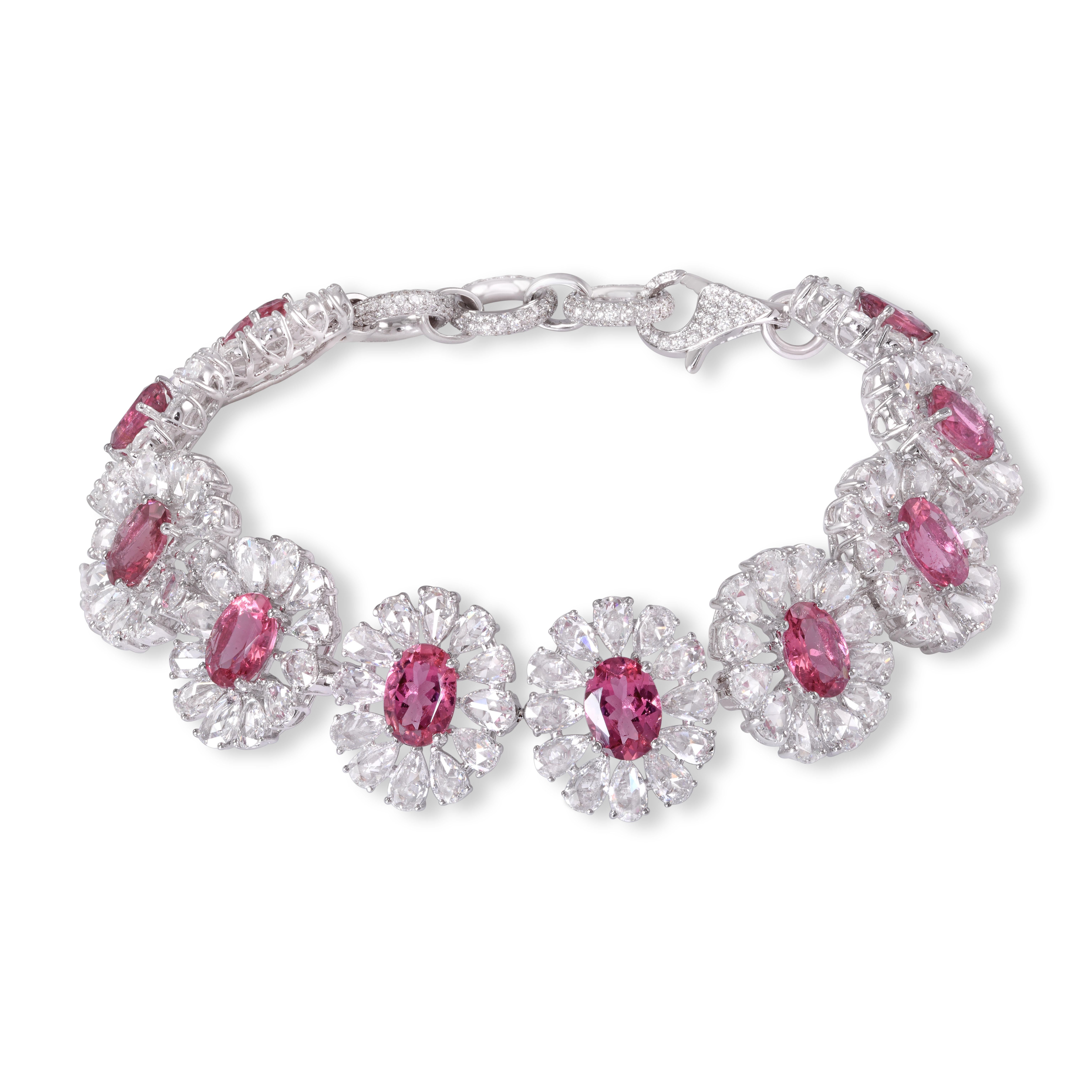 Paying homage to the unrivalled beauty of the flower, the floral clusters of this bracelet echo across the wrist. 6.97cts of playful pink tourmaline are framed by 9.91cts of rose-cut diamonds, forming the petals. 

Total diamond weight 10.58cts.