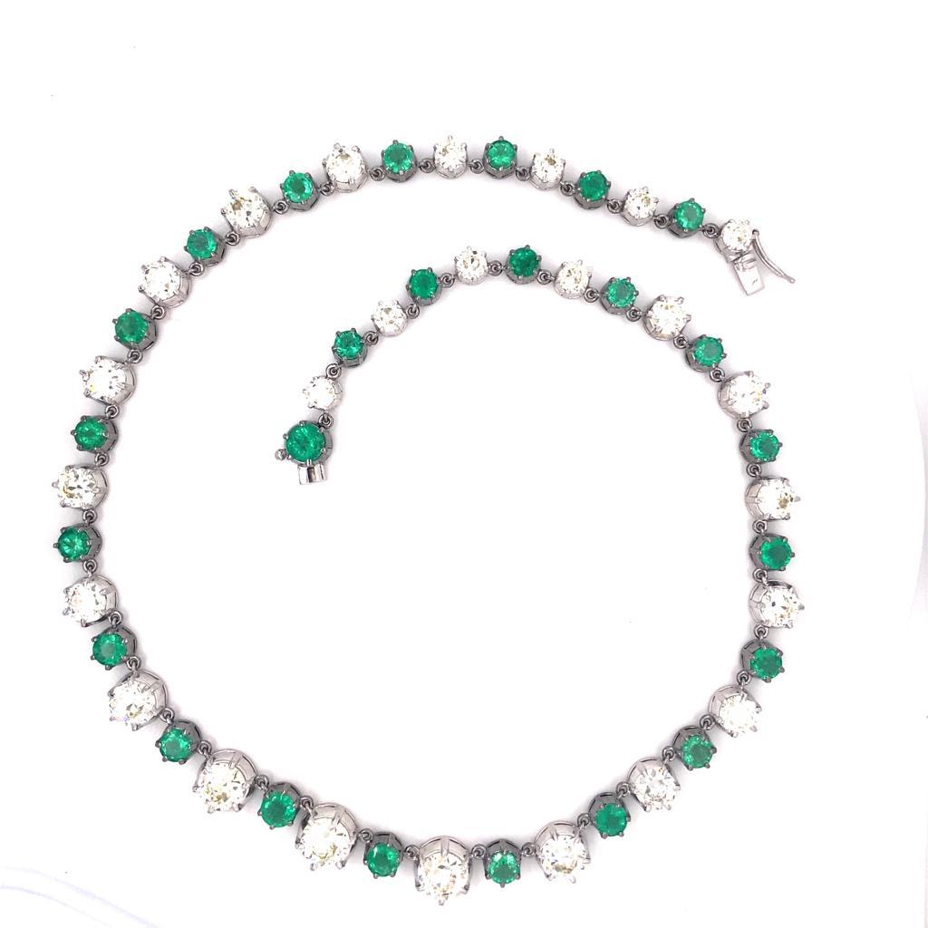 The bold, sculptural design of this Old cut diamonds and Emerald in 18K gold link bracelet is a splendid example of modernism. This chunky bracelet connects with link, creating a powerful architectural presence. The considered construction of the