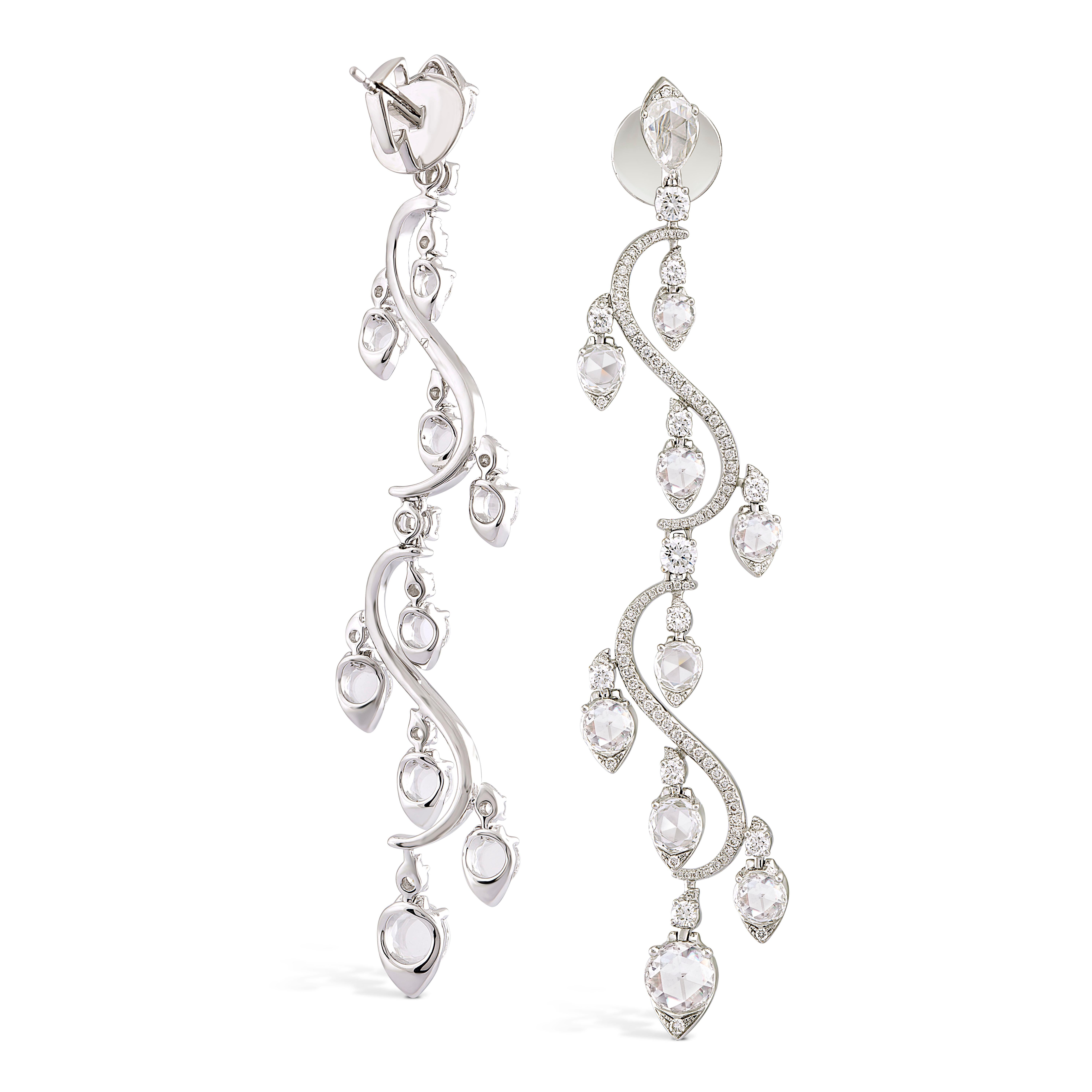 With their fluid form, these timeless earrings drape sensuously from the ear. Intricately crafted with 18 rondelles of graduating sizes and finished with 212 round brilliant cut diamonds, these earrings are reflective of Rarever's delicate touch and