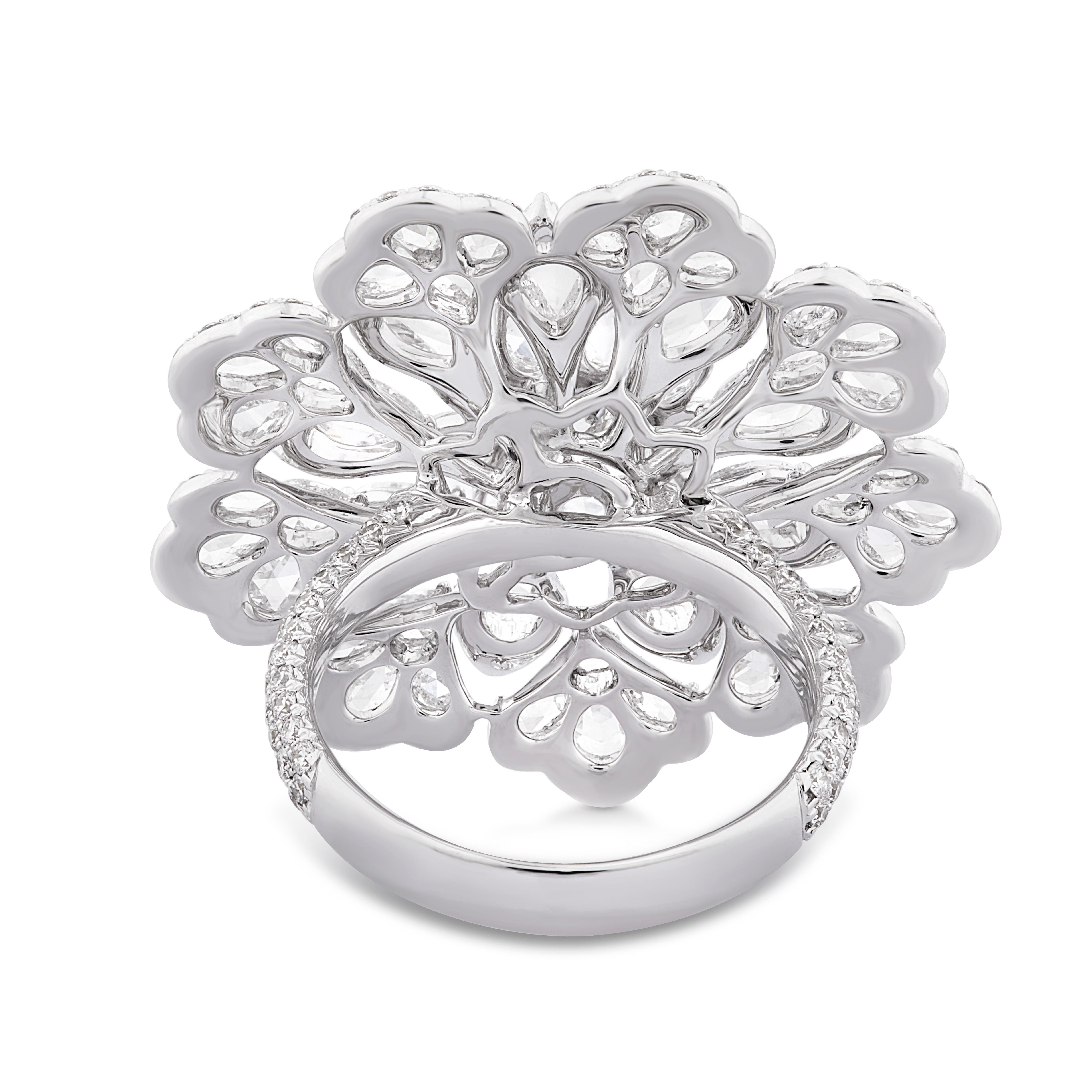 Rarever brings the floral collection taking the inspiration from the beauty and uniqueness of the flower. The Cocktail Ring is crafted with 54 pear shaped Rose Cut Diamonds set in step setting to attain the floral form of the earring, surrounding