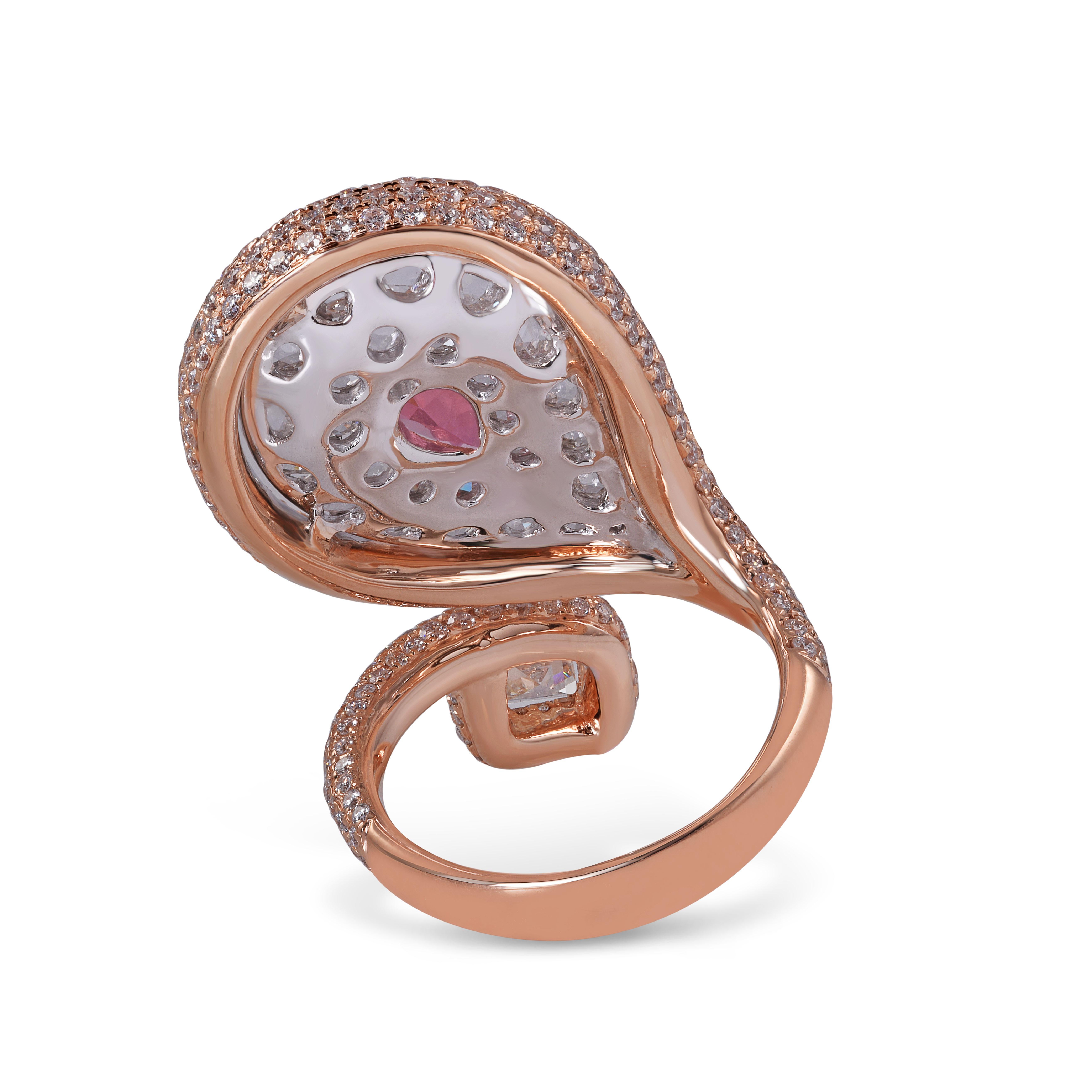 Combining the vivid pink hue of tourmaline with the unrivalled clarity of diamonds, this ring finds inspiration in the contrast of the natural world. 18k rose gold curves are draped in 324 micro pave brilliant-cut diamonds, culminating in a single
