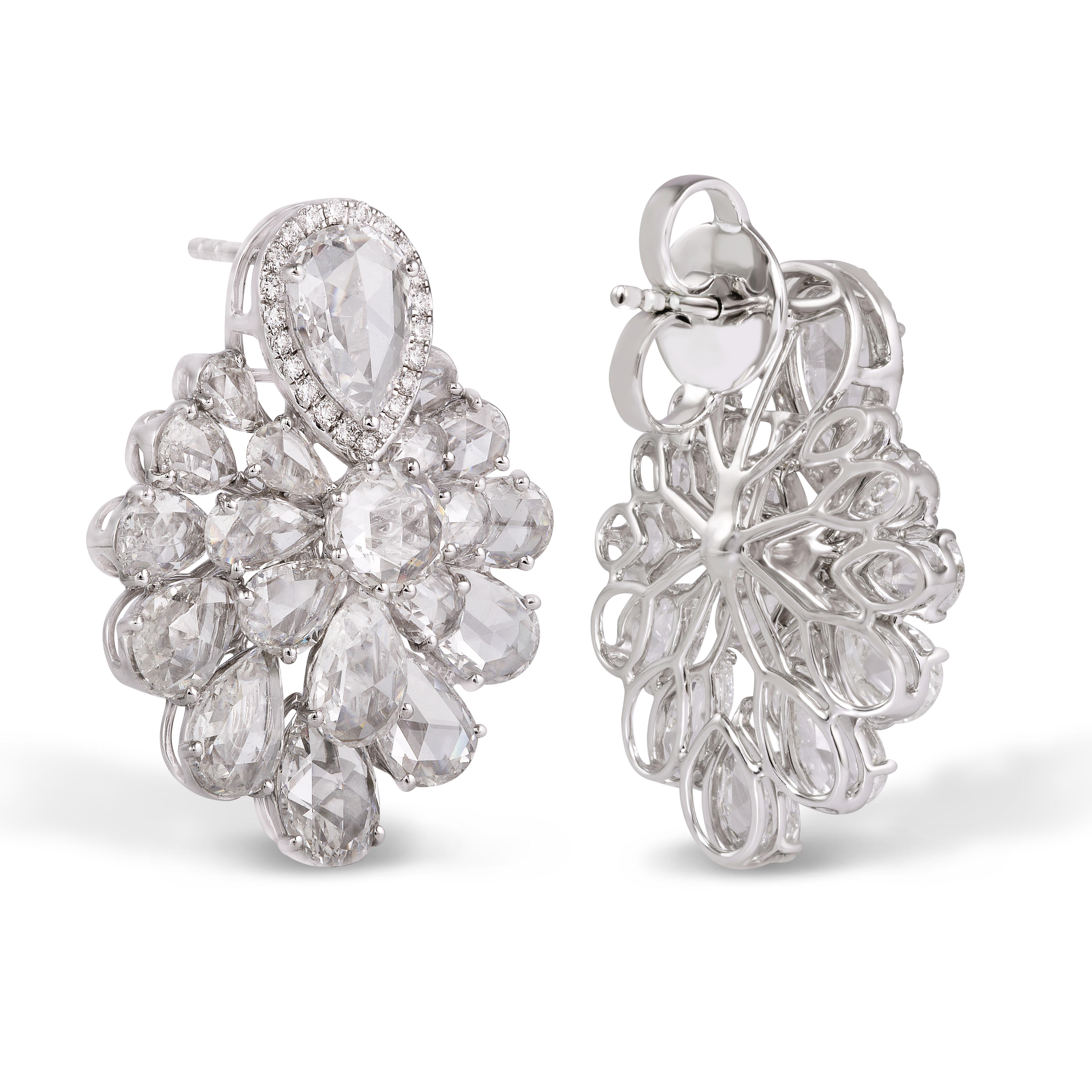 Taking inspiration from the unmistakable beauty of the flower, these earrings are crafted with 40 rose-cut diamonds, in a step setting to enhance their floral form.  Created in 18-karat rose gold, these earrings are encrusted with 9.95 carats of