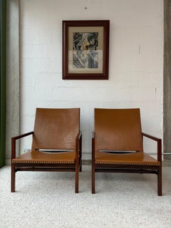 Rarissime paire de fauteuils par Joaquim Tenreiro