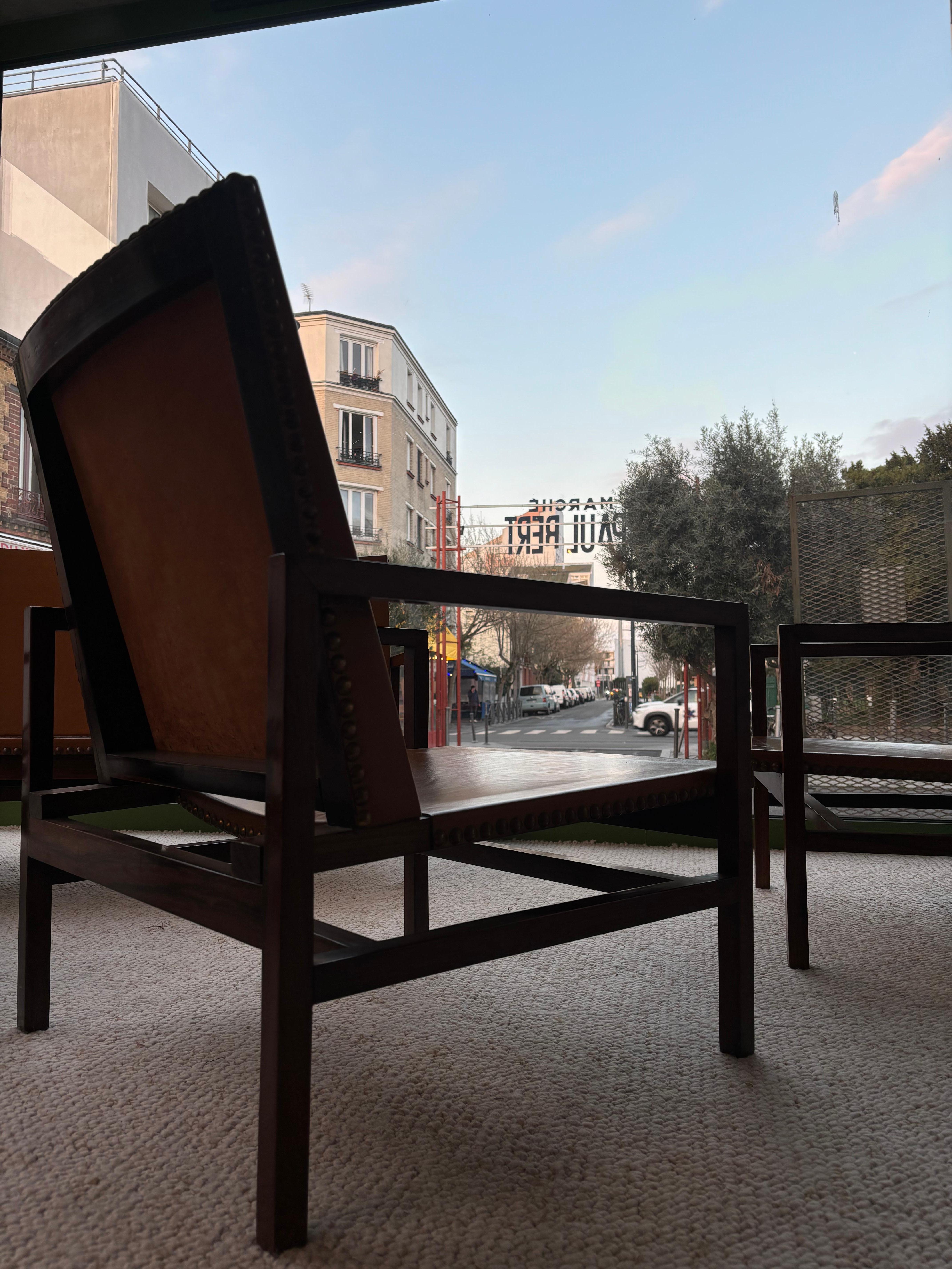 Rarissime paire de fauteuils par Joaquim Tenreiro Cuero en venta