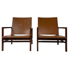 Rarissime paire de fauteuils par Joaquim Tenreiro