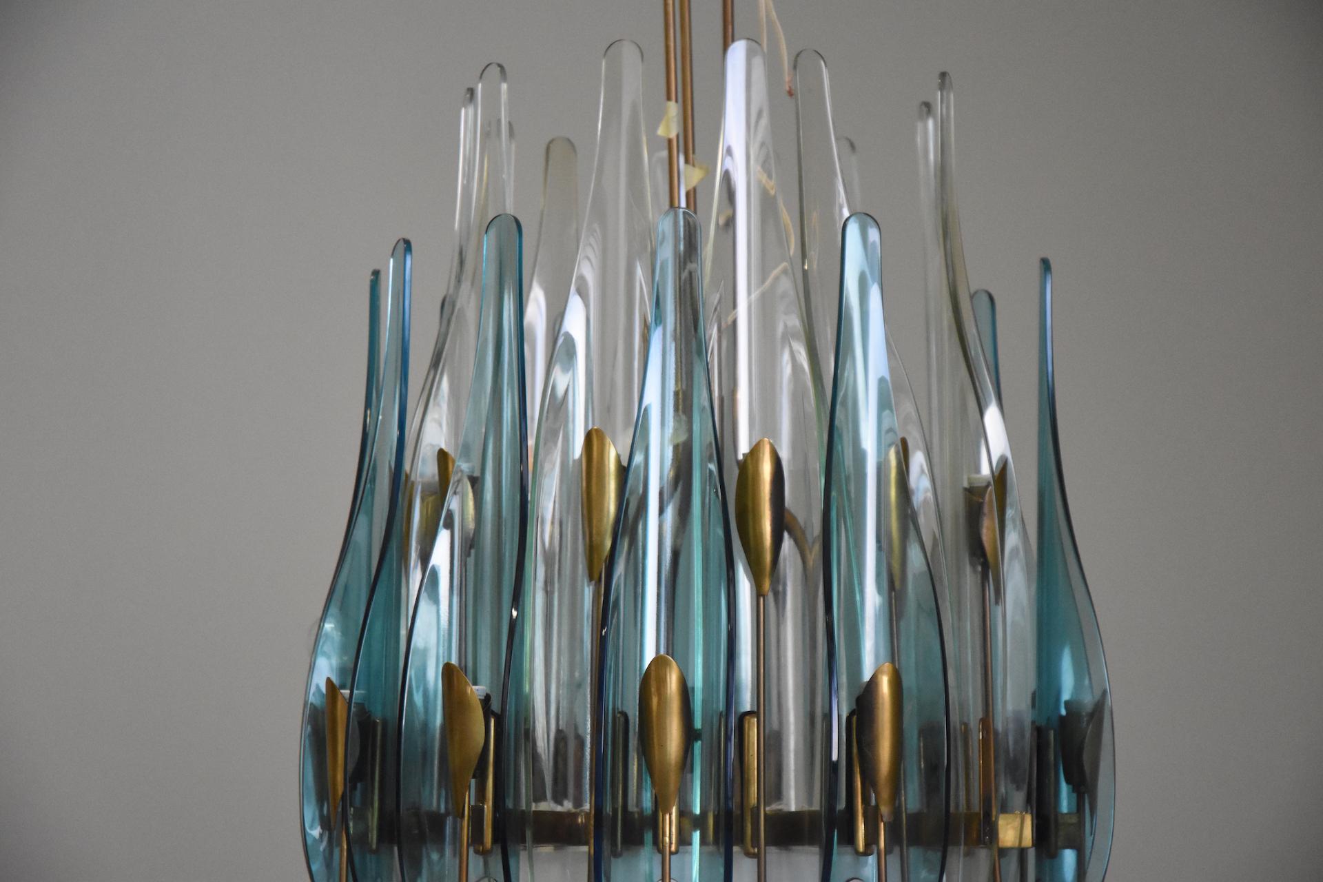 Rare beautiful 24-light Dahlia chandelier designed by Max Ingrand, made in Milan, 1954 by Fontana Arte.
light blue and light shades arranged vertically in curved glass and cut on  brass frame, great quality. 
Really one of the most beautiful