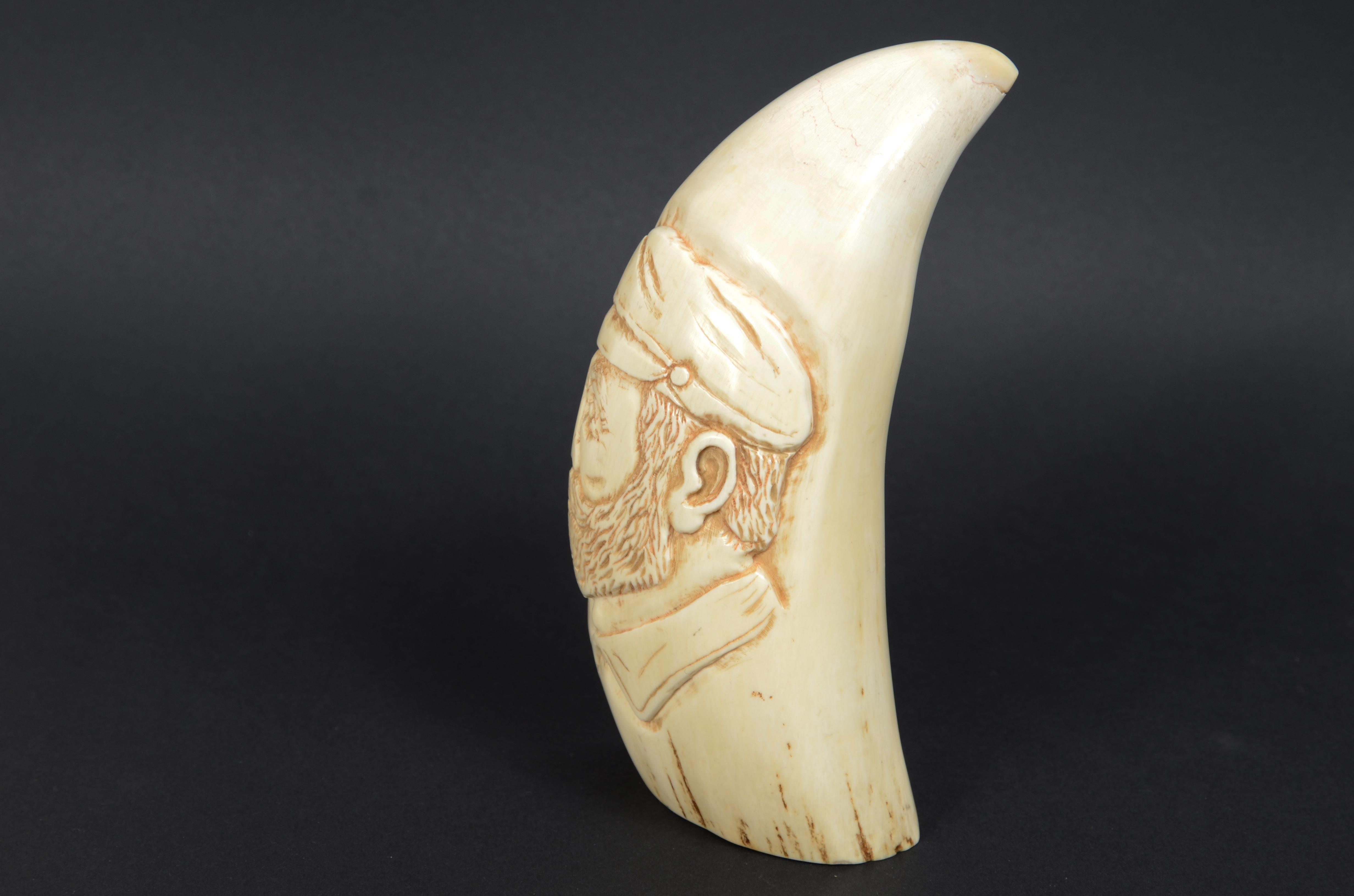Mid-19th Century Rare scrimshaw of large whale tooth in vertical bas-relief a sailor For Sale
