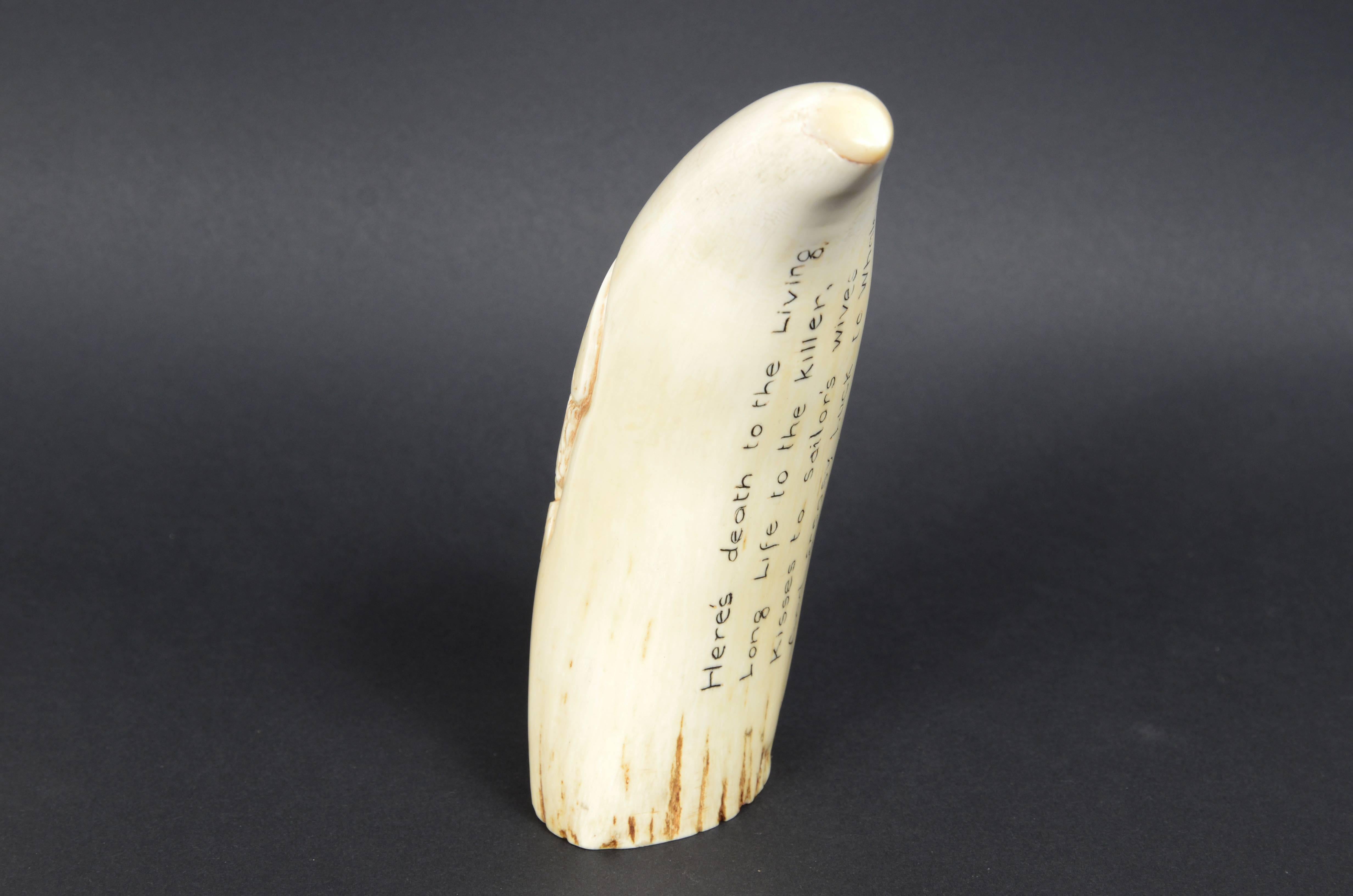 Rare scrimshaw of large whale tooth in vertical bas-relief a sailor For Sale 1