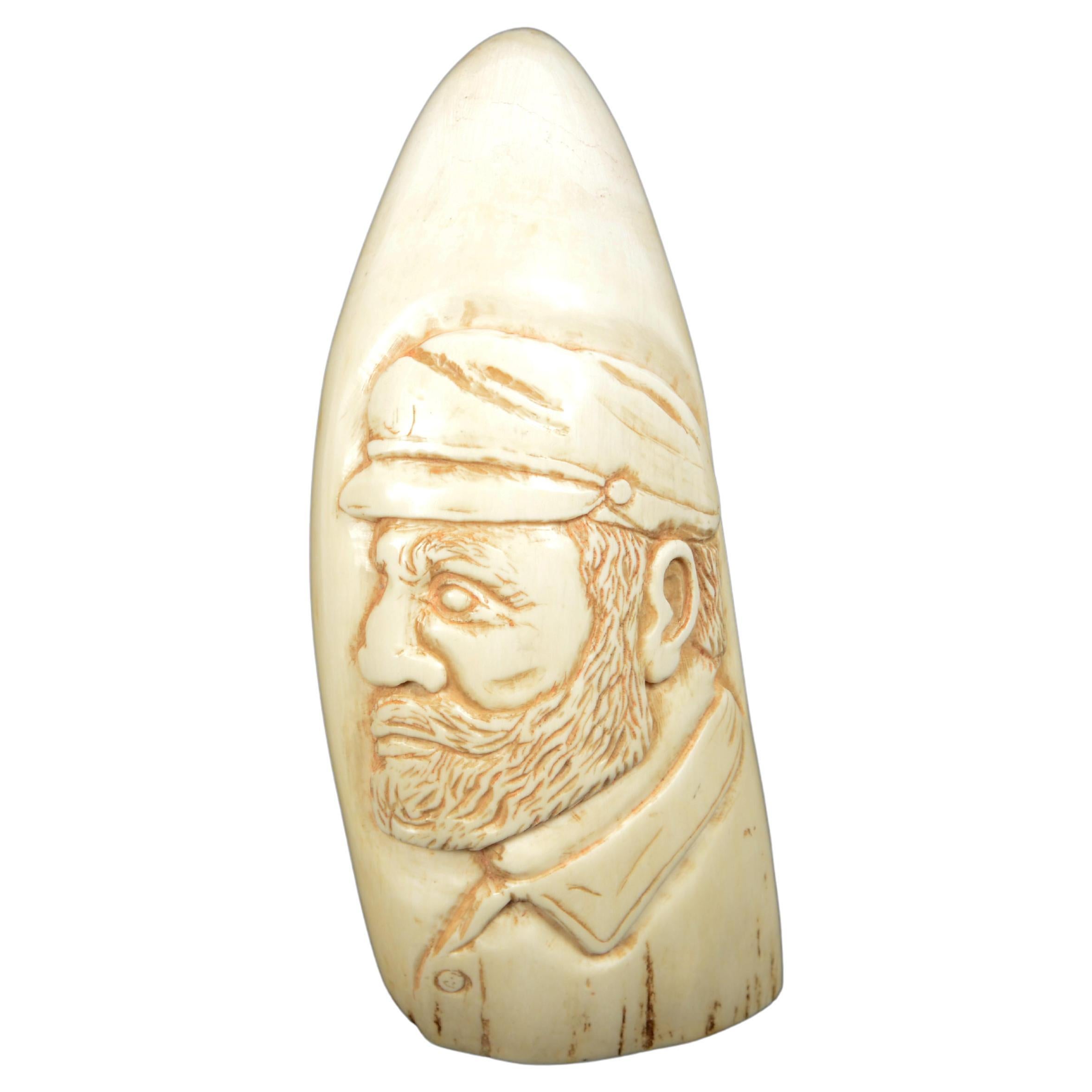 Rare scrimshaw of large whale tooth in vertical bas-relief a sailor For Sale