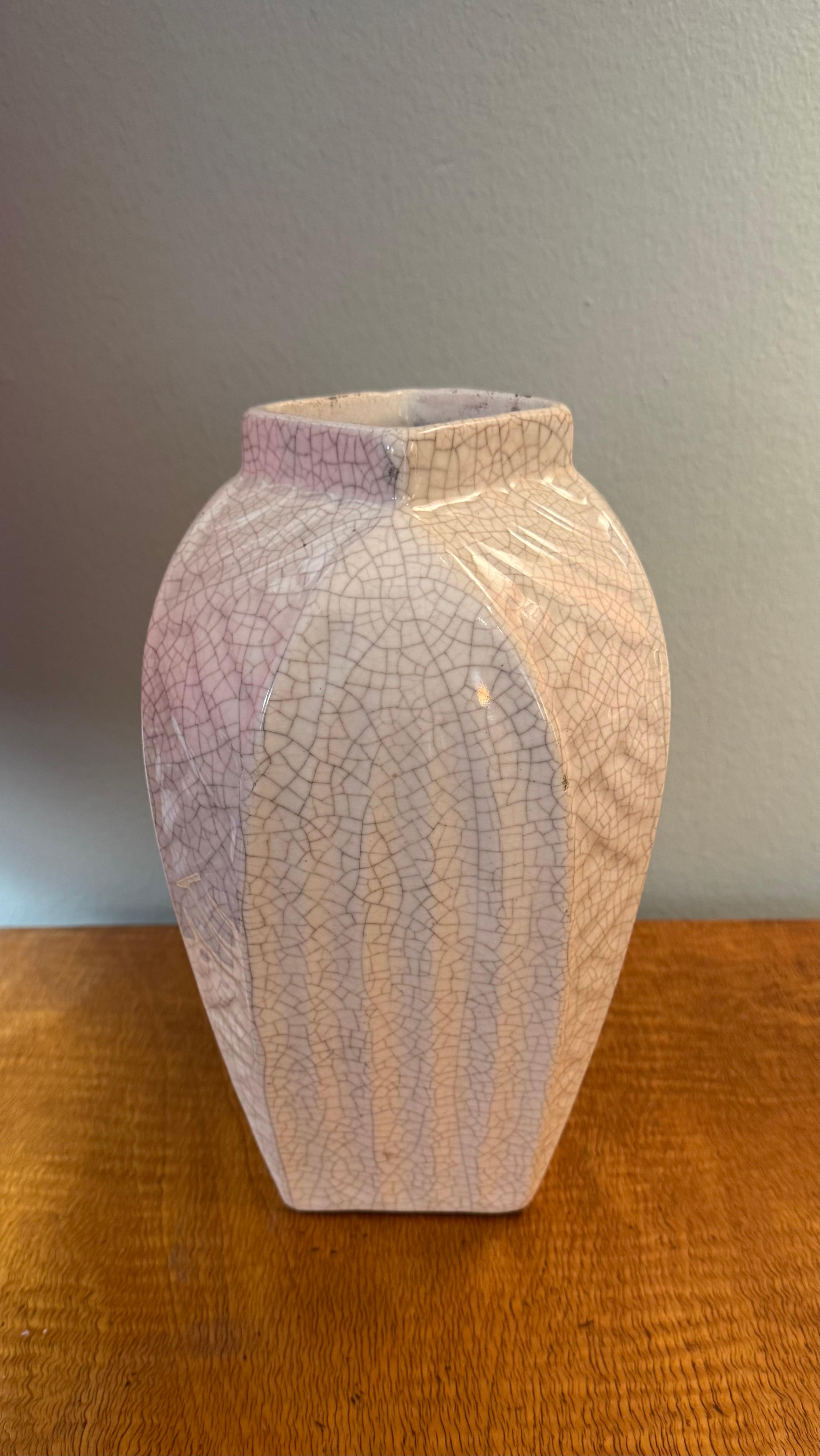 Gorgeous craquele ceramic vase, made in France in 1930.
The firing technique called craquele is the most sophisticated in the twentieth century; in fact, it involves firing the pottery to the limit of breaking it.
Doing so gives a unique texture to